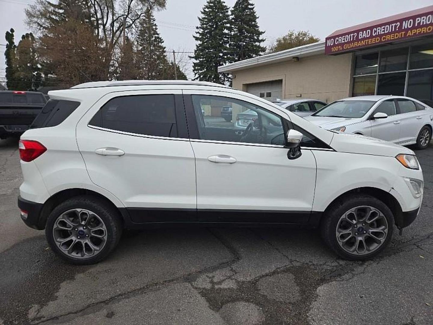 2019 WHITE /BLACK Ford EcoSport Titanium AWD (MAJ6S3KL7KC) with an 2.0L L4 DOHC 16V engine, 6A transmission, located at 3304 Woodville Road, Northwood, OH, 43619, (419) 210-8019, 41.612694, -83.480743 - Your #1 Destination for Auto Loans and mdash;No Matter Your Credit!At our dealership, we believe everyone deserves the opportunity to drive their dream car and mdash;whether you have good credit, bad credit, or no credit at all. With a wide selection of hundreds of cars, trucks, and SUVs, you'll fin - Photo#5