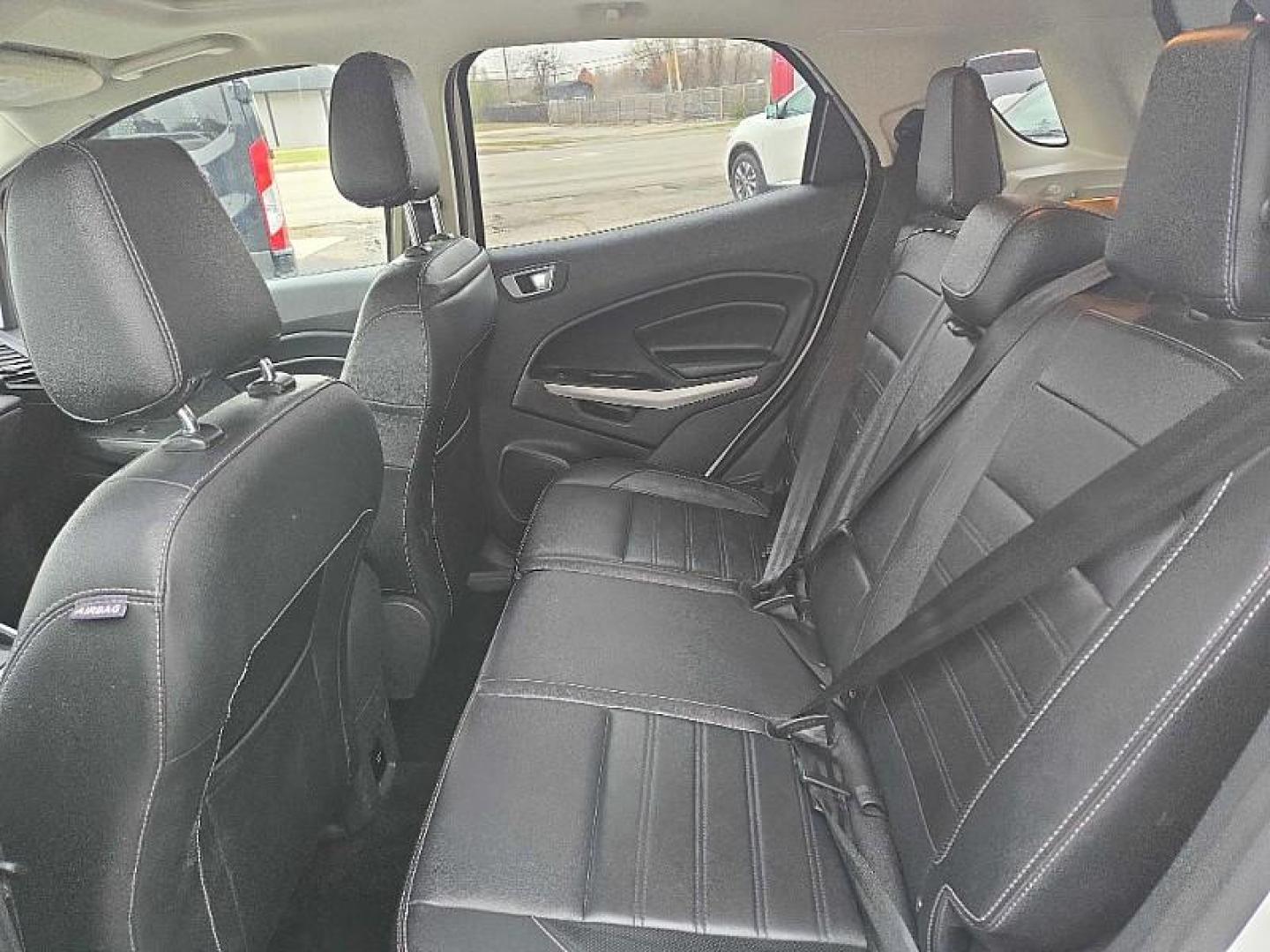 2019 WHITE /BLACK Ford EcoSport Titanium AWD (MAJ6S3KL7KC) with an 2.0L L4 DOHC 16V engine, 6A transmission, located at 3304 Woodville Road, Northwood, OH, 43619, (419) 210-8019, 41.612694, -83.480743 - Your #1 Destination for Auto Loans and mdash;No Matter Your Credit!At our dealership, we believe everyone deserves the opportunity to drive their dream car and mdash;whether you have good credit, bad credit, or no credit at all. With a wide selection of hundreds of cars, trucks, and SUVs, you'll fin - Photo#11