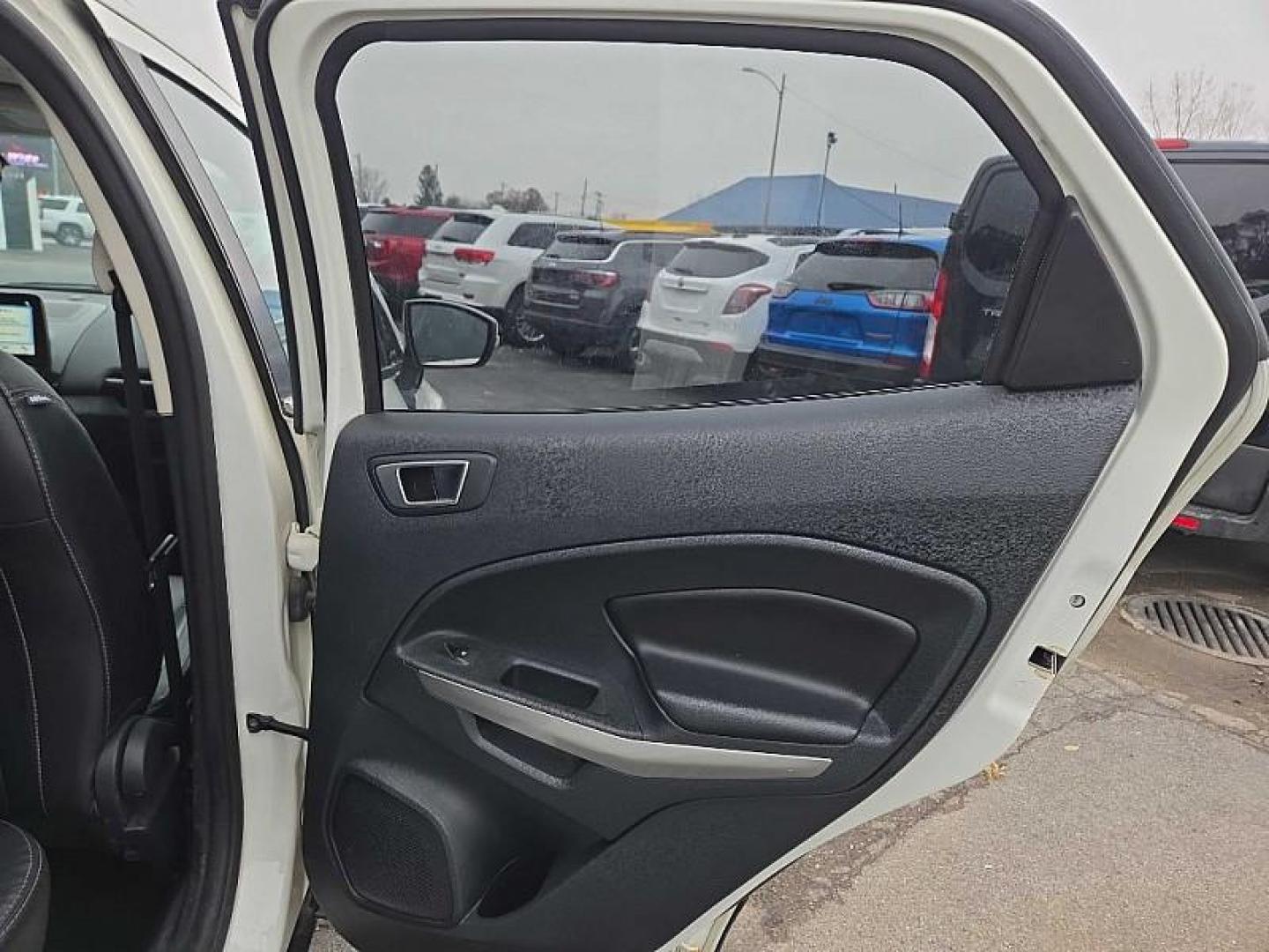 2019 WHITE /BLACK Ford EcoSport Titanium AWD (MAJ6S3KL7KC) with an 2.0L L4 DOHC 16V engine, 6A transmission, located at 3304 Woodville Road, Northwood, OH, 43619, (419) 210-8019, 41.612694, -83.480743 - Your #1 Destination for Auto Loans and mdash;No Matter Your Credit!At our dealership, we believe everyone deserves the opportunity to drive their dream car and mdash;whether you have good credit, bad credit, or no credit at all. With a wide selection of hundreds of cars, trucks, and SUVs, you'll fin - Photo#13