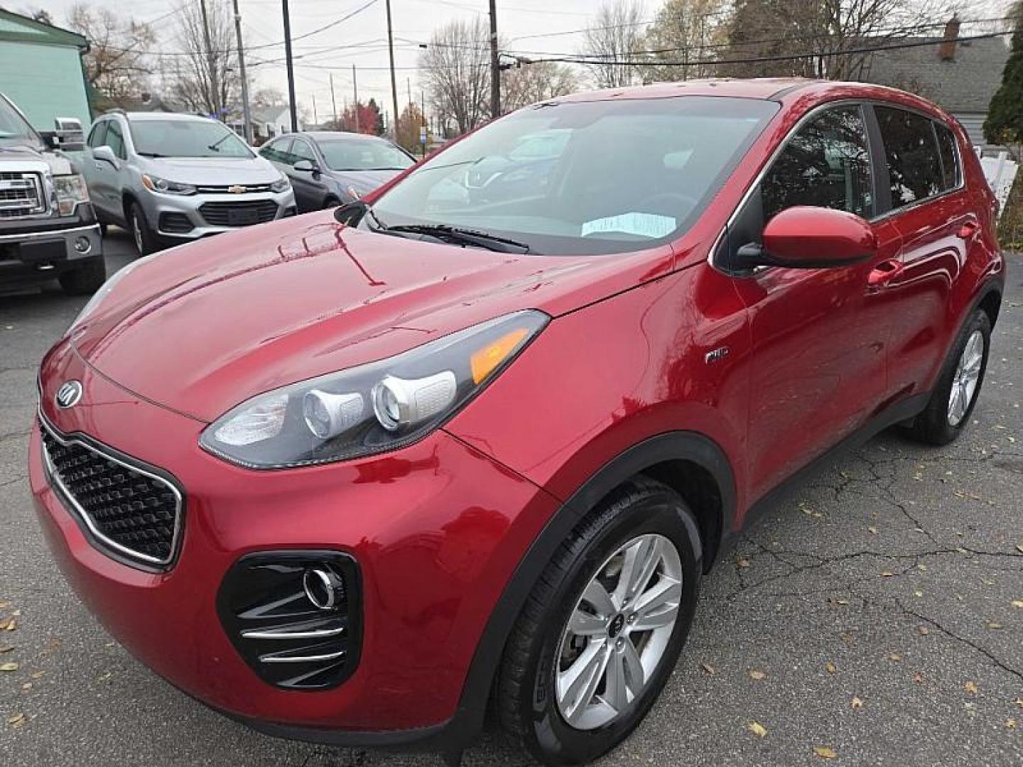 2019 RED /BLACK Kia Sportage LX AWD (KNDPMCAC8K7) with an 2.4L V6 DOHC 24V engine, 6A transmission, located at 3304 Woodville Road, Northwood, OH, 43619, (419) 210-8019, 41.612694, -83.480743 - Your #1 Destination for Auto Loans and mdash;No Matter Your Credit!At our dealership, we believe everyone deserves the opportunity to drive their dream car and mdash;whether you have good credit, bad credit, or no credit at all. With a wide selection of hundreds of cars, trucks, and SUVs, you'll fin - Photo#0