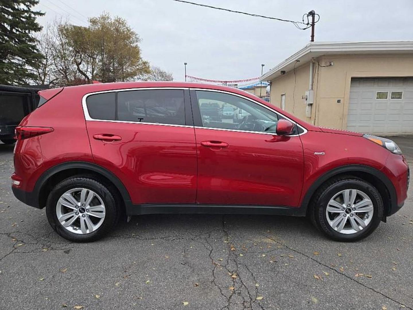 2019 RED /BLACK Kia Sportage LX AWD (KNDPMCAC8K7) with an 2.4L V6 DOHC 24V engine, 6A transmission, located at 3304 Woodville Road, Northwood, OH, 43619, (419) 210-8019, 41.612694, -83.480743 - Your #1 Destination for Auto Loans and mdash;No Matter Your Credit!At our dealership, we believe everyone deserves the opportunity to drive their dream car and mdash;whether you have good credit, bad credit, or no credit at all. With a wide selection of hundreds of cars, trucks, and SUVs, you'll fin - Photo#5