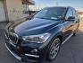 2018 BLACK /BLACK BMW X1 xDrive28i (WBXHT3C36J5) with an 2.0L L4 DOHC 16V engine, 8A transmission, located at 3304 Woodville Road, Northwood, OH, 43619, (419) 210-8019, 41.612694, -83.480743 - Your #1 Destination for Auto Loans and mdash;No Matter Your Credit!At our dealership, we believe everyone deserves the opportunity to drive their dream car and mdash;whether you have good credit, bad credit, or no credit at all. With a wide selection of hundreds of cars, trucks, and SUVs, you'll fin - Photo#0