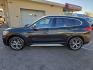 2018 BLACK /BLACK BMW X1 xDrive28i (WBXHT3C36J5) with an 2.0L L4 DOHC 16V engine, 8A transmission, located at 3304 Woodville Road, Northwood, OH, 43619, (419) 210-8019, 41.612694, -83.480743 - Your #1 Destination for Auto Loans and mdash;No Matter Your Credit!At our dealership, we believe everyone deserves the opportunity to drive their dream car and mdash;whether you have good credit, bad credit, or no credit at all. With a wide selection of hundreds of cars, trucks, and SUVs, you'll fin - Photo#1