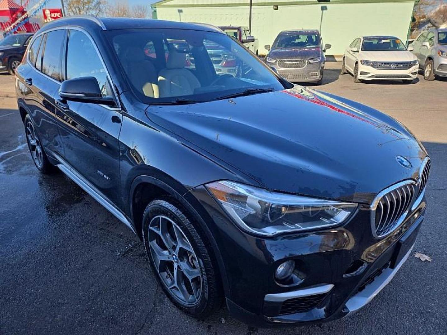 2018 BLACK /BLACK BMW X1 xDrive28i (WBXHT3C36J5) with an 2.0L L4 DOHC 16V engine, 8A transmission, located at 3304 Woodville Road, Northwood, OH, 43619, (419) 210-8019, 41.612694, -83.480743 - Your #1 Destination for Auto Loans and mdash;No Matter Your Credit!At our dealership, we believe everyone deserves the opportunity to drive their dream car and mdash;whether you have good credit, bad credit, or no credit at all. With a wide selection of hundreds of cars, trucks, and SUVs, you'll fin - Photo#6