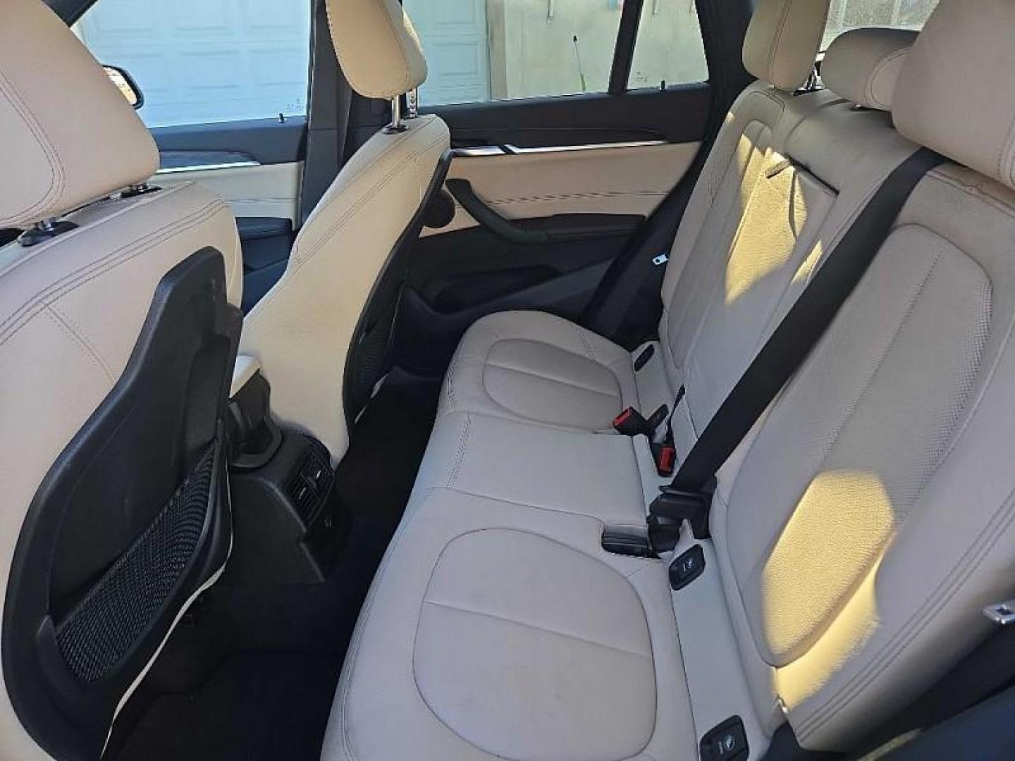 2018 BLACK /BLACK BMW X1 xDrive28i (WBXHT3C36J5) with an 2.0L L4 DOHC 16V engine, 8A transmission, located at 3304 Woodville Road, Northwood, OH, 43619, (419) 210-8019, 41.612694, -83.480743 - Your #1 Destination for Auto Loans and mdash;No Matter Your Credit!At our dealership, we believe everyone deserves the opportunity to drive their dream car and mdash;whether you have good credit, bad credit, or no credit at all. With a wide selection of hundreds of cars, trucks, and SUVs, you'll fin - Photo#11