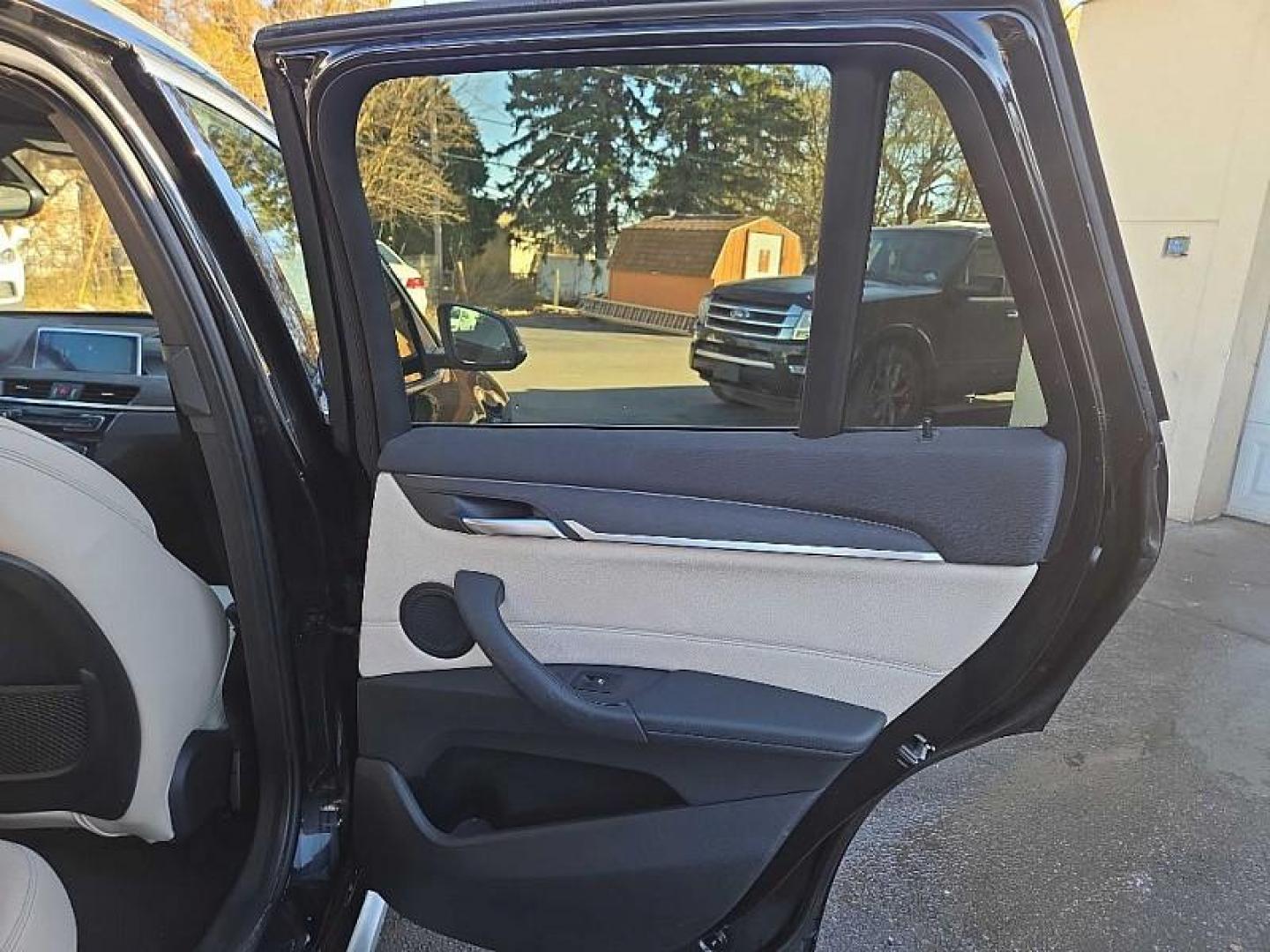 2018 BLACK /BLACK BMW X1 xDrive28i (WBXHT3C36J5) with an 2.0L L4 DOHC 16V engine, 8A transmission, located at 3304 Woodville Road, Northwood, OH, 43619, (419) 210-8019, 41.612694, -83.480743 - Your #1 Destination for Auto Loans and mdash;No Matter Your Credit!At our dealership, we believe everyone deserves the opportunity to drive their dream car and mdash;whether you have good credit, bad credit, or no credit at all. With a wide selection of hundreds of cars, trucks, and SUVs, you'll fin - Photo#13