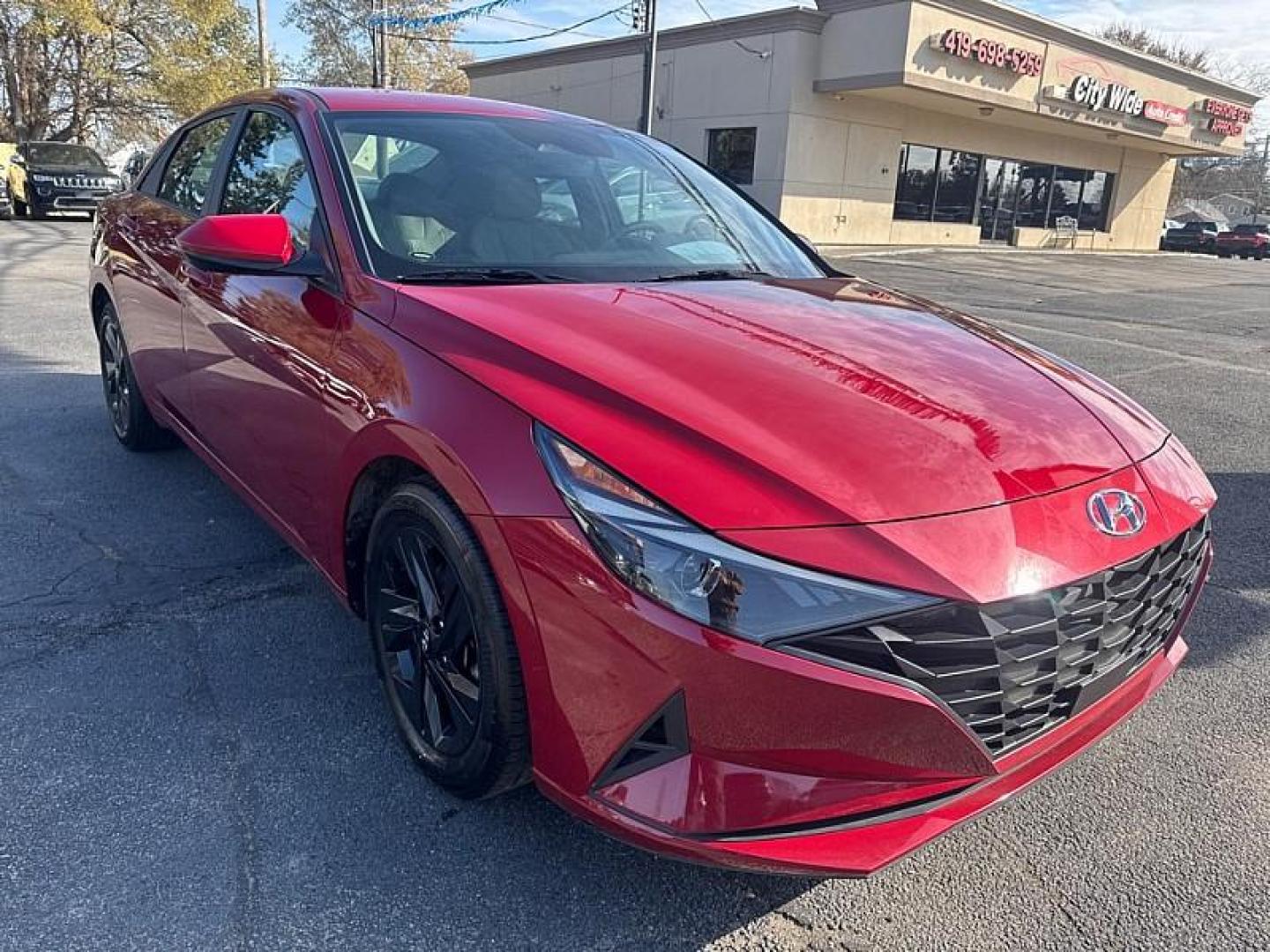 2021 RED /GRAY Hyundai Elantra SEL (KMHLS4AG1MU) with an 1.6L L4 DOHC 16V engine, 6A transmission, located at 3304 Woodville Road, Northwood, OH, 43619, (419) 210-8019, 41.612694, -83.480743 - Your #1 Destination for Auto Loans and mdash;No Matter Your Credit!At our dealership, we believe everyone deserves the opportunity to drive their dream car and mdash;whether you have good credit, bad credit, or no credit at all. With a wide selection of hundreds of cars, trucks, and SUVs, you'll fin - Photo#6