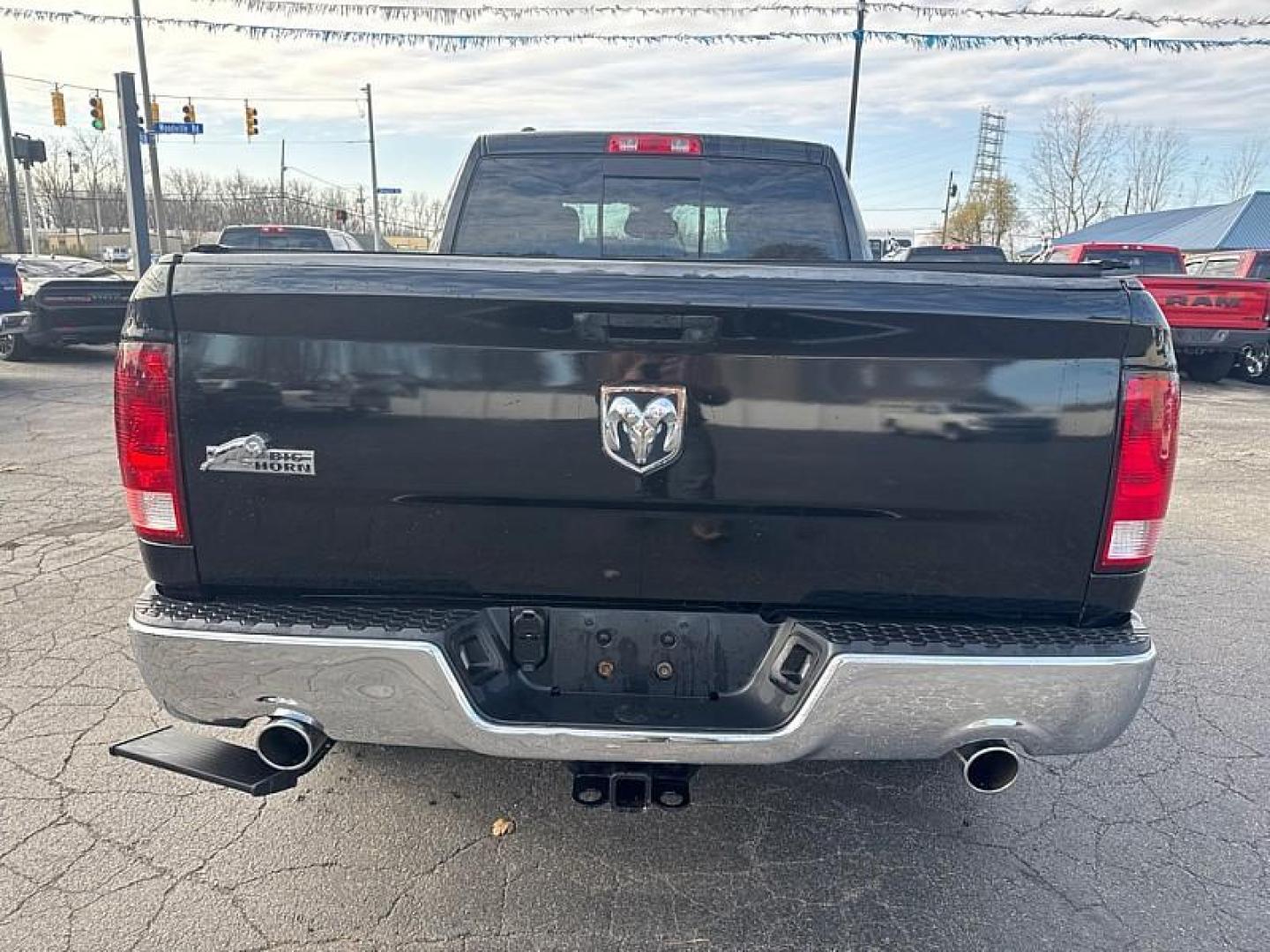 2016 BLACK /BLACK RAM 1500 SLT Quad Cab 2WD (1C6RR6GT0GS) with an 5.7L V8 OHV 16V engine, 6A transmission, located at 3304 Woodville Road, Northwood, OH, 43619, (419) 210-8019, 41.612694, -83.480743 - Your #1 Destination for Auto Loans and mdash;No Matter Your Credit!At our dealership, we believe everyone deserves the opportunity to drive their dream car and mdash;whether you have good credit, bad credit, or no credit at all. With a wide selection of hundreds of cars, trucks, and SUVs, you'll fin - Photo#3