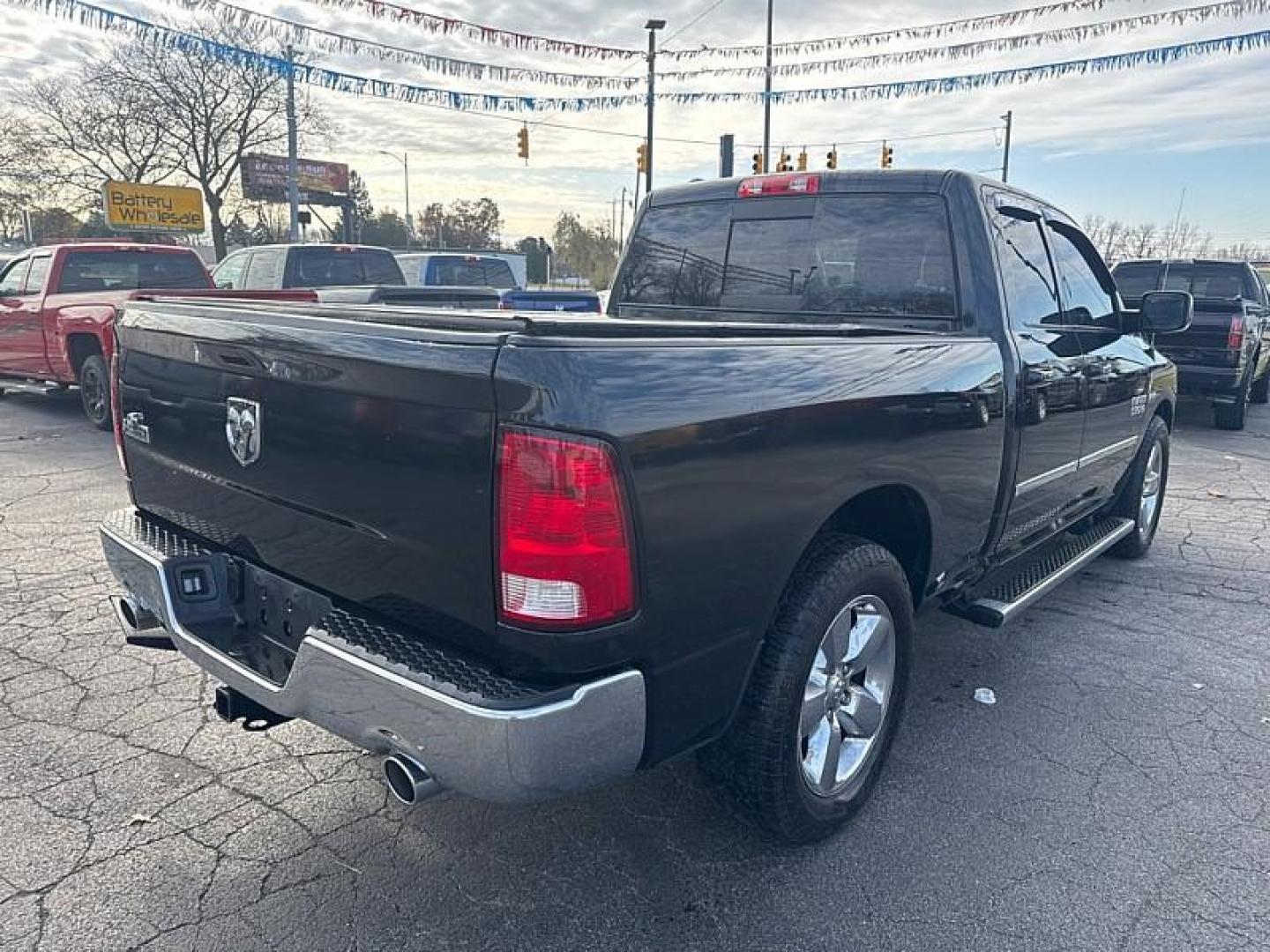 2016 BLACK /BLACK RAM 1500 SLT Quad Cab 2WD (1C6RR6GT0GS) with an 5.7L V8 OHV 16V engine, 6A transmission, located at 3304 Woodville Road, Northwood, OH, 43619, (419) 210-8019, 41.612694, -83.480743 - Your #1 Destination for Auto Loans and mdash;No Matter Your Credit!At our dealership, we believe everyone deserves the opportunity to drive their dream car and mdash;whether you have good credit, bad credit, or no credit at all. With a wide selection of hundreds of cars, trucks, and SUVs, you'll fin - Photo#4