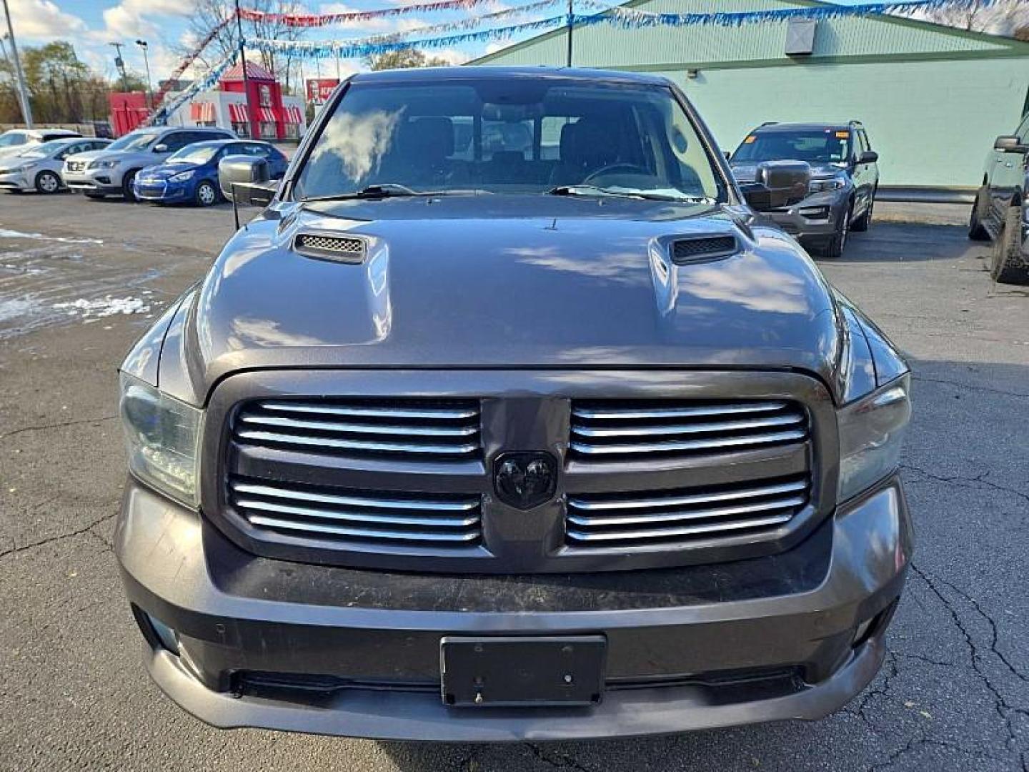 2015 GRAY /BLACK RAM 1500 Sport Crew Cab SWB 4WD (1C6RR7MT3FS) with an 5.7L V8 OHV 16V engine, 6-Speed Automatic transmission, located at 3304 Woodville Road, Northwood, OH, 43619, (419) 210-8019, 41.612694, -83.480743 - Your #1 Destination for Auto Loans and mdash;No Matter Your Credit!At our dealership, we believe everyone deserves the opportunity to drive their dream car and mdash;whether you have good credit, bad credit, or no credit at all. With a wide selection of hundreds of cars, trucks, and SUVs, you'll fin - Photo#7