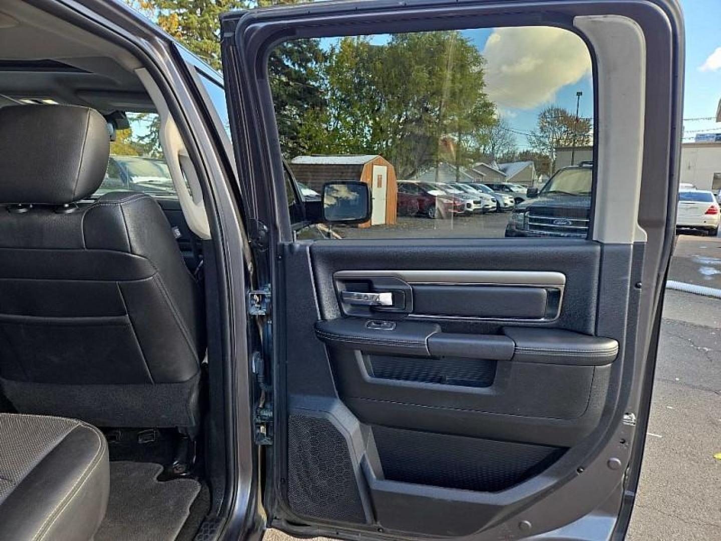 2015 GRAY /BLACK RAM 1500 Sport Crew Cab SWB 4WD (1C6RR7MT3FS) with an 5.7L V8 OHV 16V engine, 6-Speed Automatic transmission, located at 3304 Woodville Road, Northwood, OH, 43619, (419) 210-8019, 41.612694, -83.480743 - Your #1 Destination for Auto Loans and mdash;No Matter Your Credit!At our dealership, we believe everyone deserves the opportunity to drive their dream car and mdash;whether you have good credit, bad credit, or no credit at all. With a wide selection of hundreds of cars, trucks, and SUVs, you'll fin - Photo#13