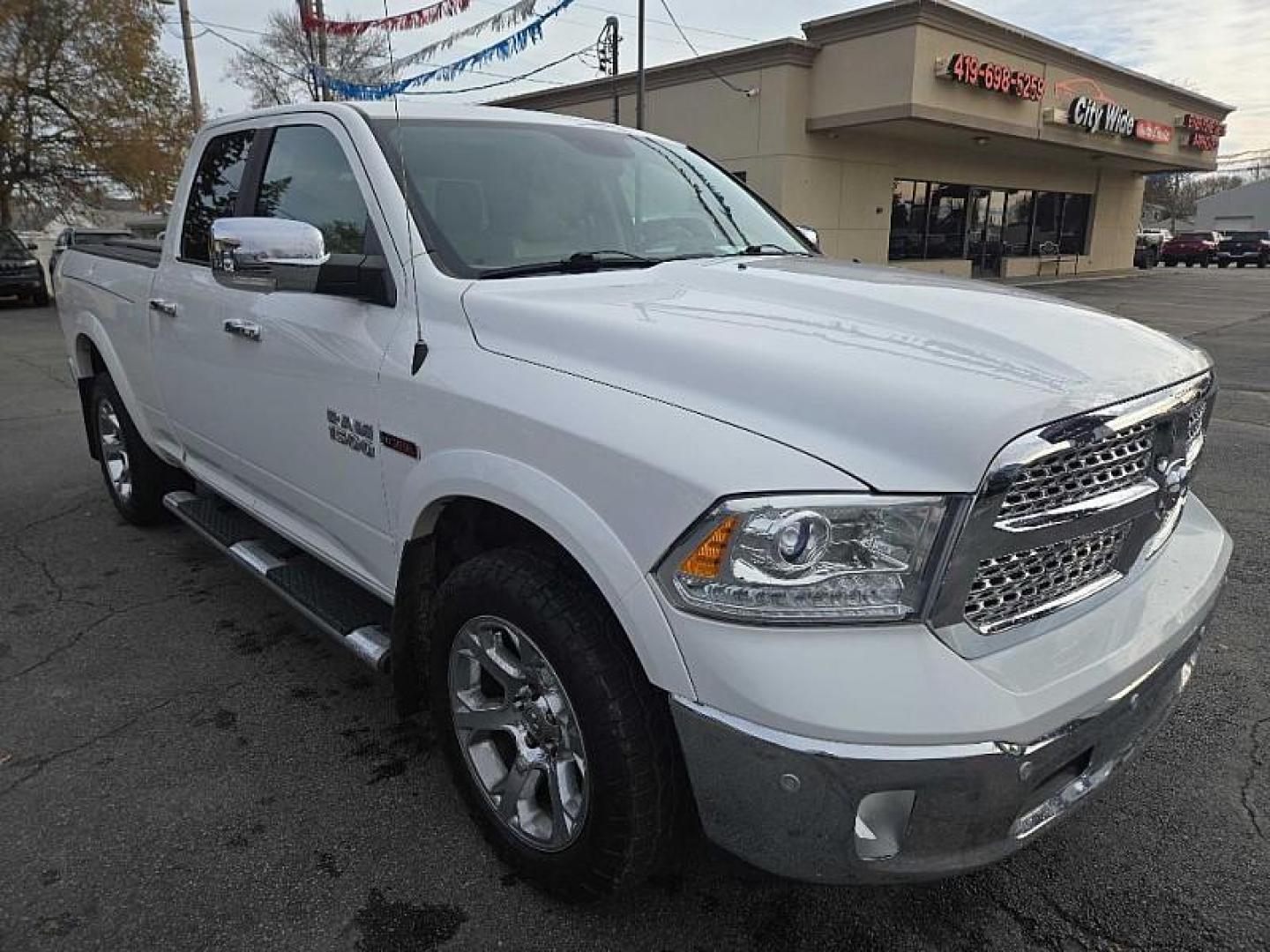 2017 WHITE /BLACK RAM 1500 Laramie Quad Cab 4WD (1C6RR7JM7HS) with an 3.0L V6 DIESEL engine, 8A transmission, located at 3304 Woodville Road, Northwood, OH, 43619, (419) 210-8019, 41.612694, -83.480743 - Photo#6