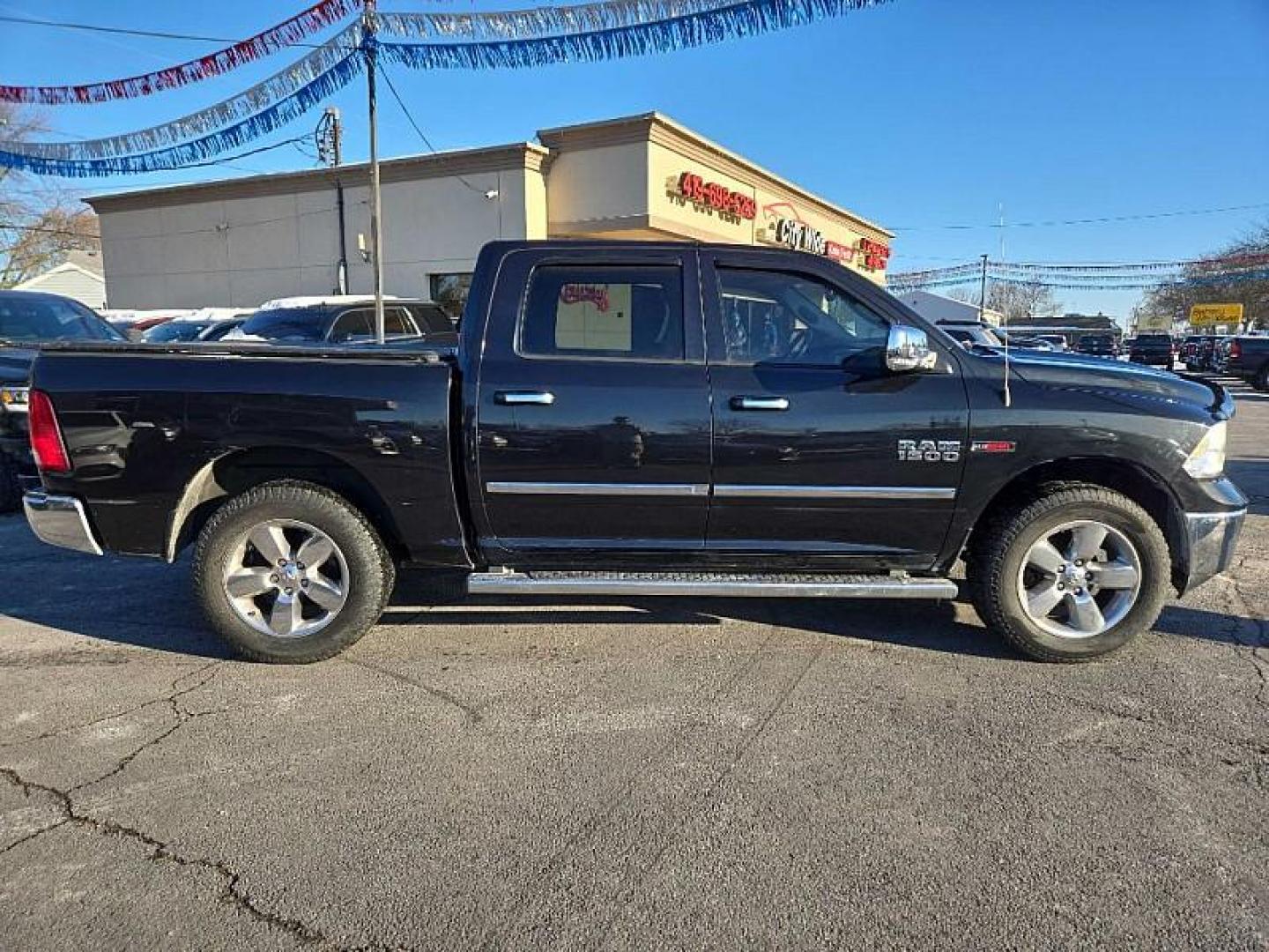 2016 BLACK /BLACK RAM 1500 SLT Crew Cab SWB 4WD (1C6RR7LMXGS) with an 3.0L V6 DIESEL engine, 6A transmission, located at 3304 Woodville Road, Northwood, OH, 43619, (419) 210-8019, 41.612694, -83.480743 - Photo#5