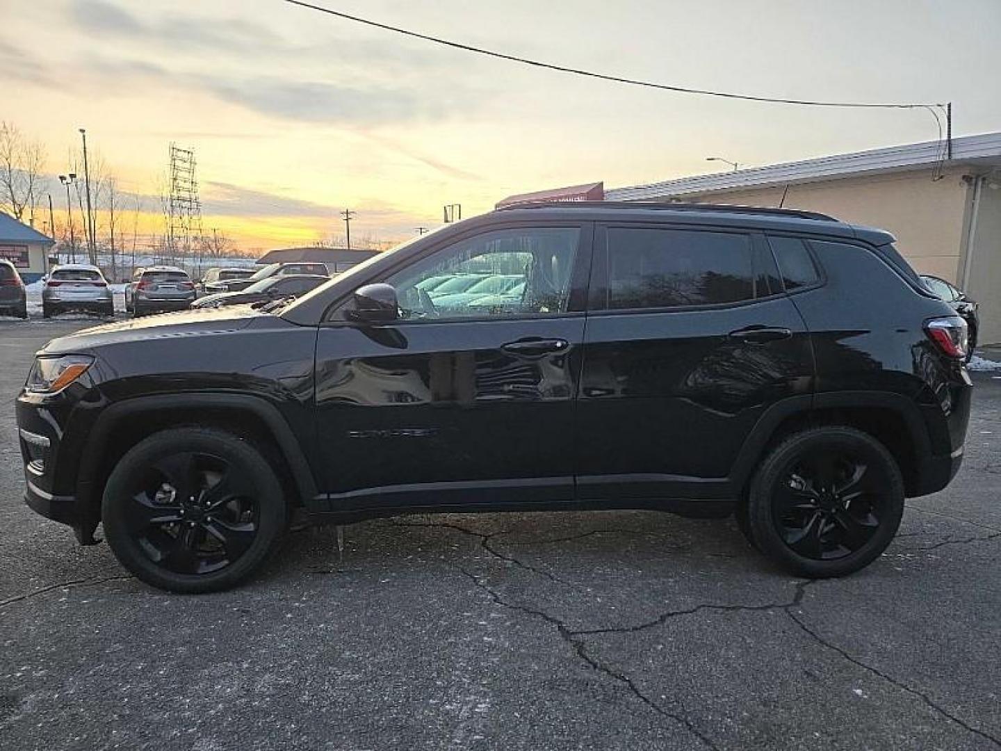 2021 BLACK Jeep Compass Latitude FWD (3C4NJCBBXMT) with an 2.4L L4 DOHC 16V engine, Automatic 6-Spd transmission, located at 3304 Woodville Road, Northwood, OH, 43619, (419) 210-8019, 41.612694, -83.480743 - Photo#1