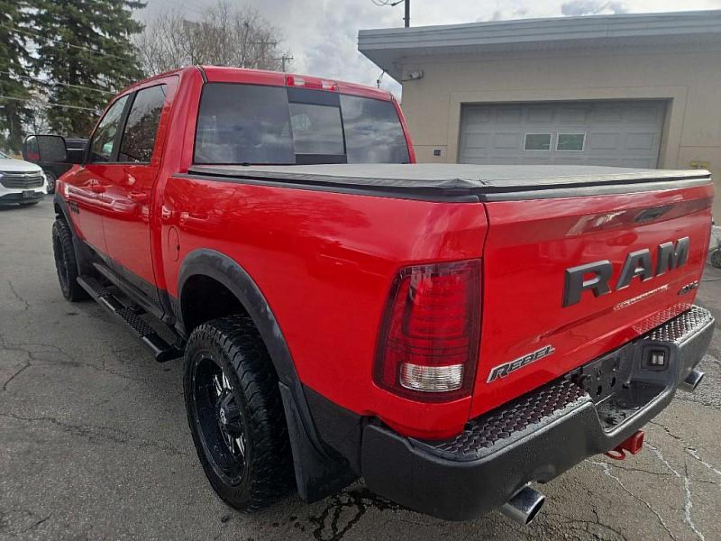 2016 RED /BLACK RAM 1500 Rebel Crew Cab SWB 4WD (1C6RR7YT2GS) with an 5.7L V8 OHV 16V engine, 6A transmission, located at 3304 Woodville Road, Northwood, OH, 43619, (419) 210-8019, 41.612694, -83.480743 - Your #1 Destination for Auto Loans and mdash;No Matter Your Credit!At our dealership, we believe everyone deserves the opportunity to drive their dream car and mdash;whether you have good credit, bad credit, or no credit at all. With a wide selection of hundreds of cars, trucks, and SUVs, you'll fin - Photo#2