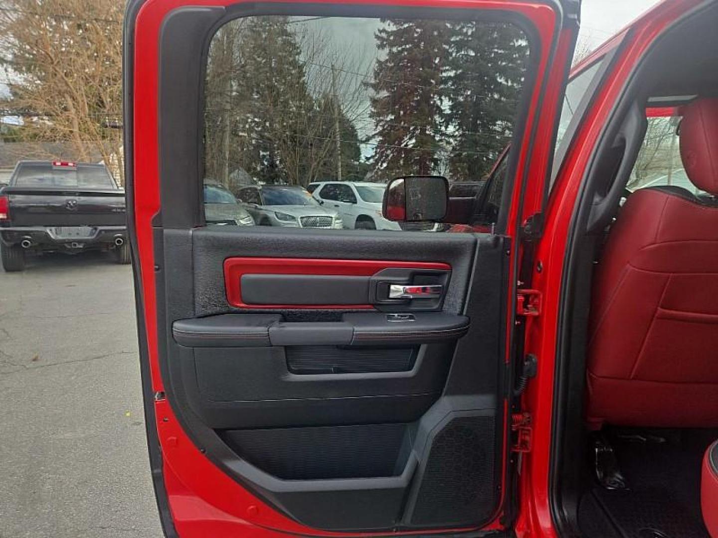 2016 RED /BLACK RAM 1500 Rebel Crew Cab SWB 4WD (1C6RR7YT2GS) with an 5.7L V8 OHV 16V engine, 6A transmission, located at 3304 Woodville Road, Northwood, OH, 43619, (419) 210-8019, 41.612694, -83.480743 - Your #1 Destination for Auto Loans and mdash;No Matter Your Credit!At our dealership, we believe everyone deserves the opportunity to drive their dream car and mdash;whether you have good credit, bad credit, or no credit at all. With a wide selection of hundreds of cars, trucks, and SUVs, you'll fin - Photo#10