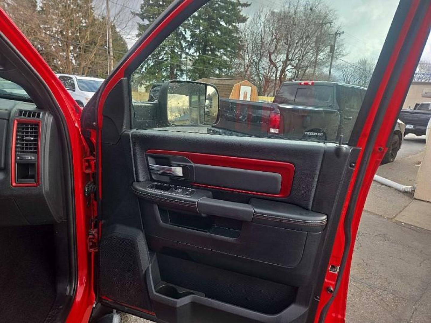 2016 RED /BLACK RAM 1500 Rebel Crew Cab SWB 4WD (1C6RR7YT2GS) with an 5.7L V8 OHV 16V engine, 6A transmission, located at 3304 Woodville Road, Northwood, OH, 43619, (419) 210-8019, 41.612694, -83.480743 - Your #1 Destination for Auto Loans and mdash;No Matter Your Credit!At our dealership, we believe everyone deserves the opportunity to drive their dream car and mdash;whether you have good credit, bad credit, or no credit at all. With a wide selection of hundreds of cars, trucks, and SUVs, you'll fin - Photo#15