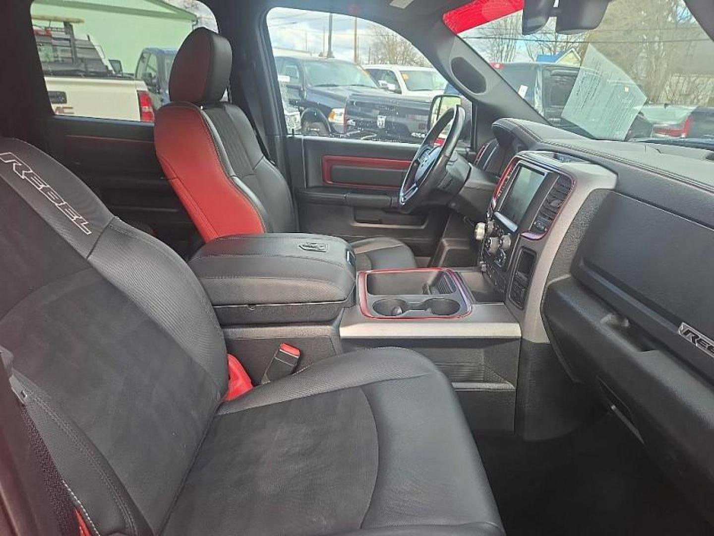 2016 RED /BLACK RAM 1500 Rebel Crew Cab SWB 4WD (1C6RR7YT2GS) with an 5.7L V8 OHV 16V engine, 6A transmission, located at 3304 Woodville Road, Northwood, OH, 43619, (419) 210-8019, 41.612694, -83.480743 - Your #1 Destination for Auto Loans and mdash;No Matter Your Credit!At our dealership, we believe everyone deserves the opportunity to drive their dream car and mdash;whether you have good credit, bad credit, or no credit at all. With a wide selection of hundreds of cars, trucks, and SUVs, you'll fin - Photo#16