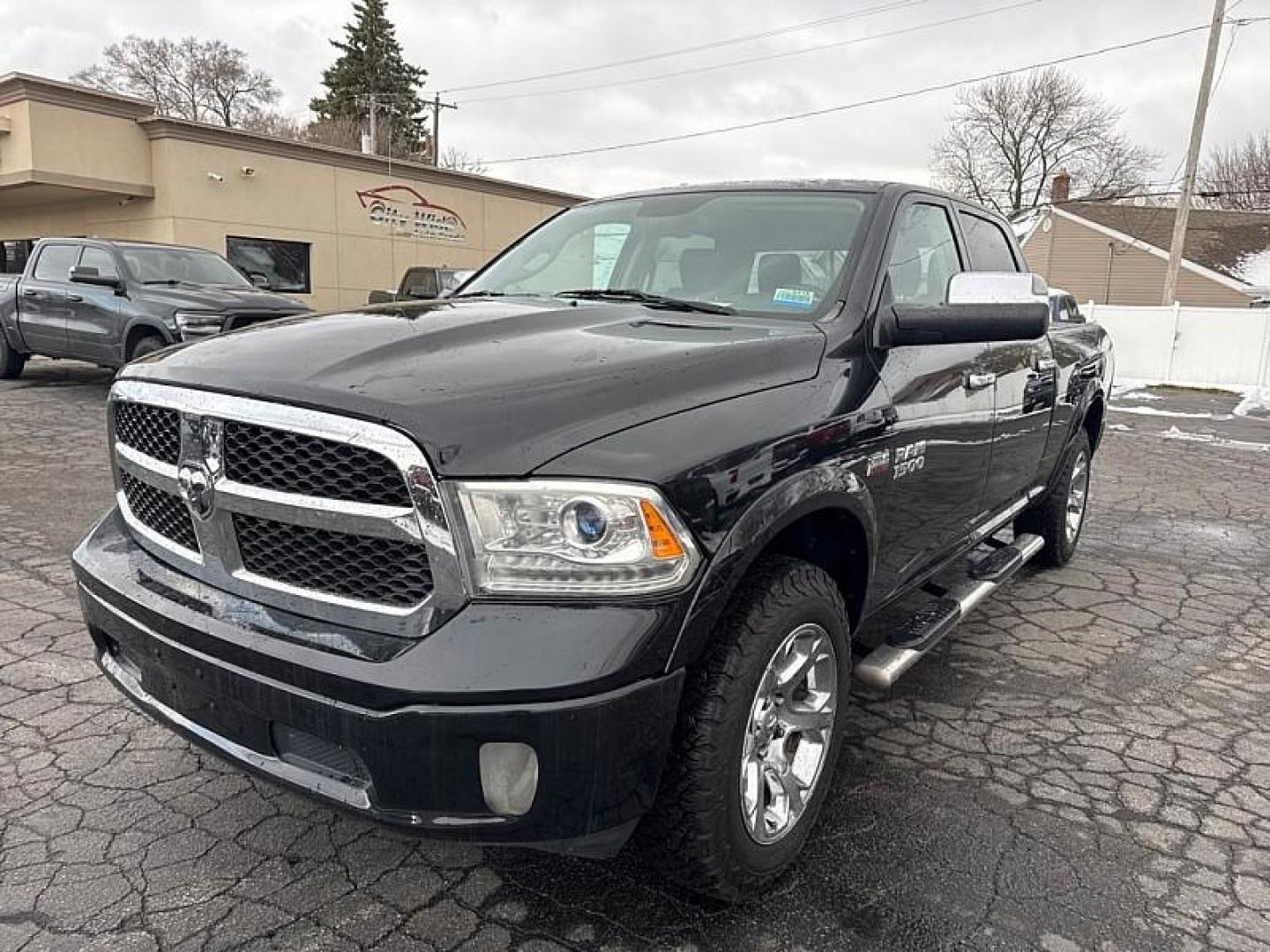 2017 BLACK /BLACK RAM 1500 Laramie Crew Cab LWB 4WD (1C6RR7VT4HS) with an 5.7L V8 OHV 16V engine, 8A transmission, located at 3304 Woodville Road, Northwood, OH, 43619, (419) 210-8019, 41.612694, -83.480743 - Your #1 Destination for Auto Loans and mdash;No Matter Your Credit!At our dealership, we believe everyone deserves the opportunity to drive their dream car and mdash;whether you have good credit, bad credit, or no credit at all. With a wide selection of hundreds of cars, trucks, and SUVs, you'll fin - Photo#0