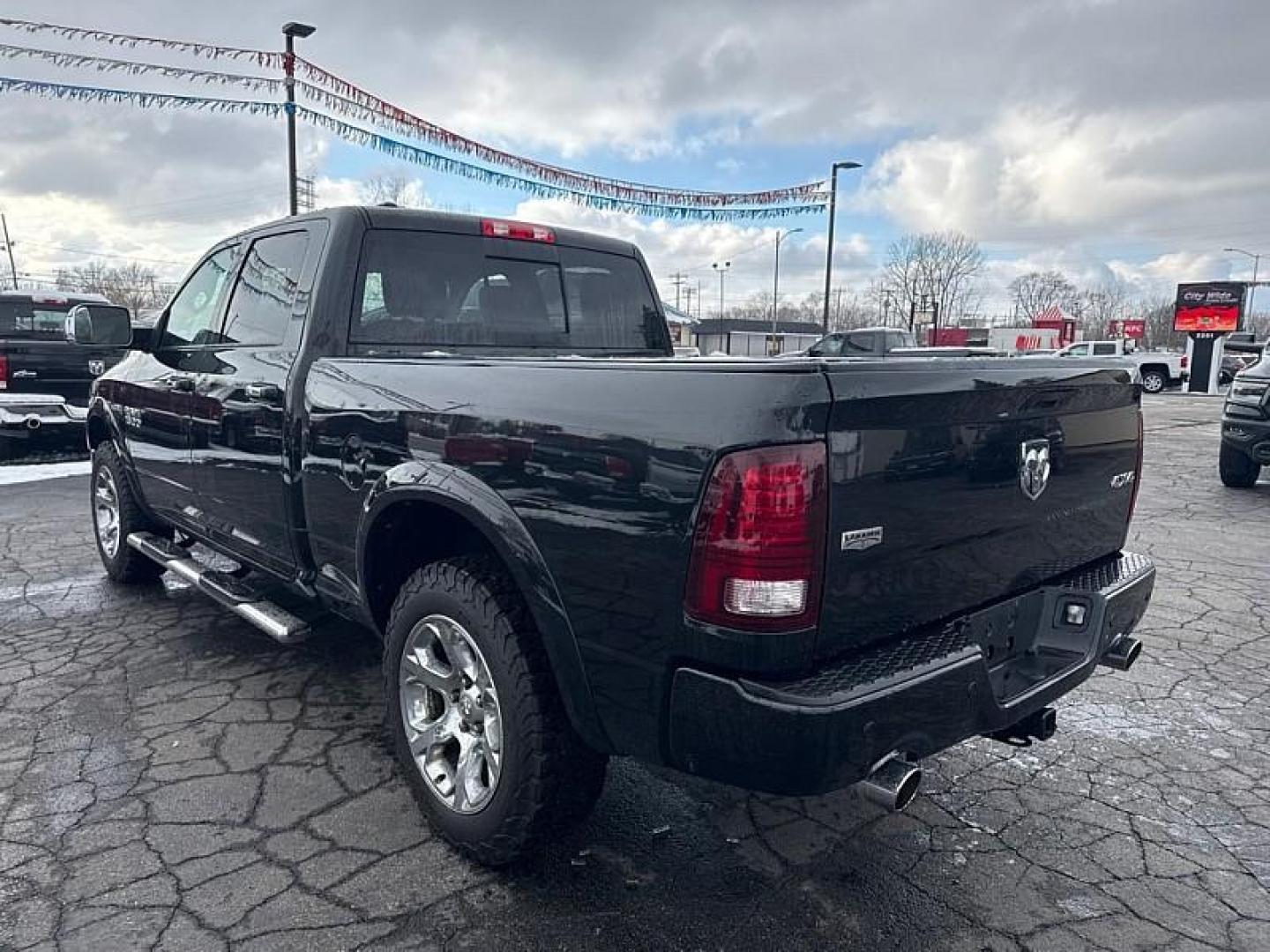 2017 BLACK /BLACK RAM 1500 Laramie Crew Cab LWB 4WD (1C6RR7VT4HS) with an 5.7L V8 OHV 16V engine, 8A transmission, located at 3304 Woodville Road, Northwood, OH, 43619, (419) 210-8019, 41.612694, -83.480743 - Your #1 Destination for Auto Loans and mdash;No Matter Your Credit!At our dealership, we believe everyone deserves the opportunity to drive their dream car and mdash;whether you have good credit, bad credit, or no credit at all. With a wide selection of hundreds of cars, trucks, and SUVs, you'll fin - Photo#2