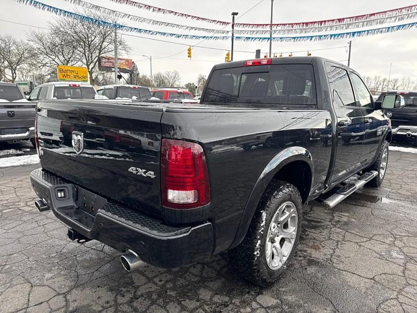 2017 BLACK /BLACK RAM 1500 Laramie Crew Cab LWB 4WD (1C6RR7VT4HS) with an 5.7L V8 OHV 16V engine, 8A transmission, located at 3304 Woodville Road, Northwood, OH, 43619, (419) 210-8019, 41.612694, -83.480743 - Your #1 Destination for Auto Loans and mdash;No Matter Your Credit!At our dealership, we believe everyone deserves the opportunity to drive their dream car and mdash;whether you have good credit, bad credit, or no credit at all. With a wide selection of hundreds of cars, trucks, and SUVs, you'll fin - Photo#4