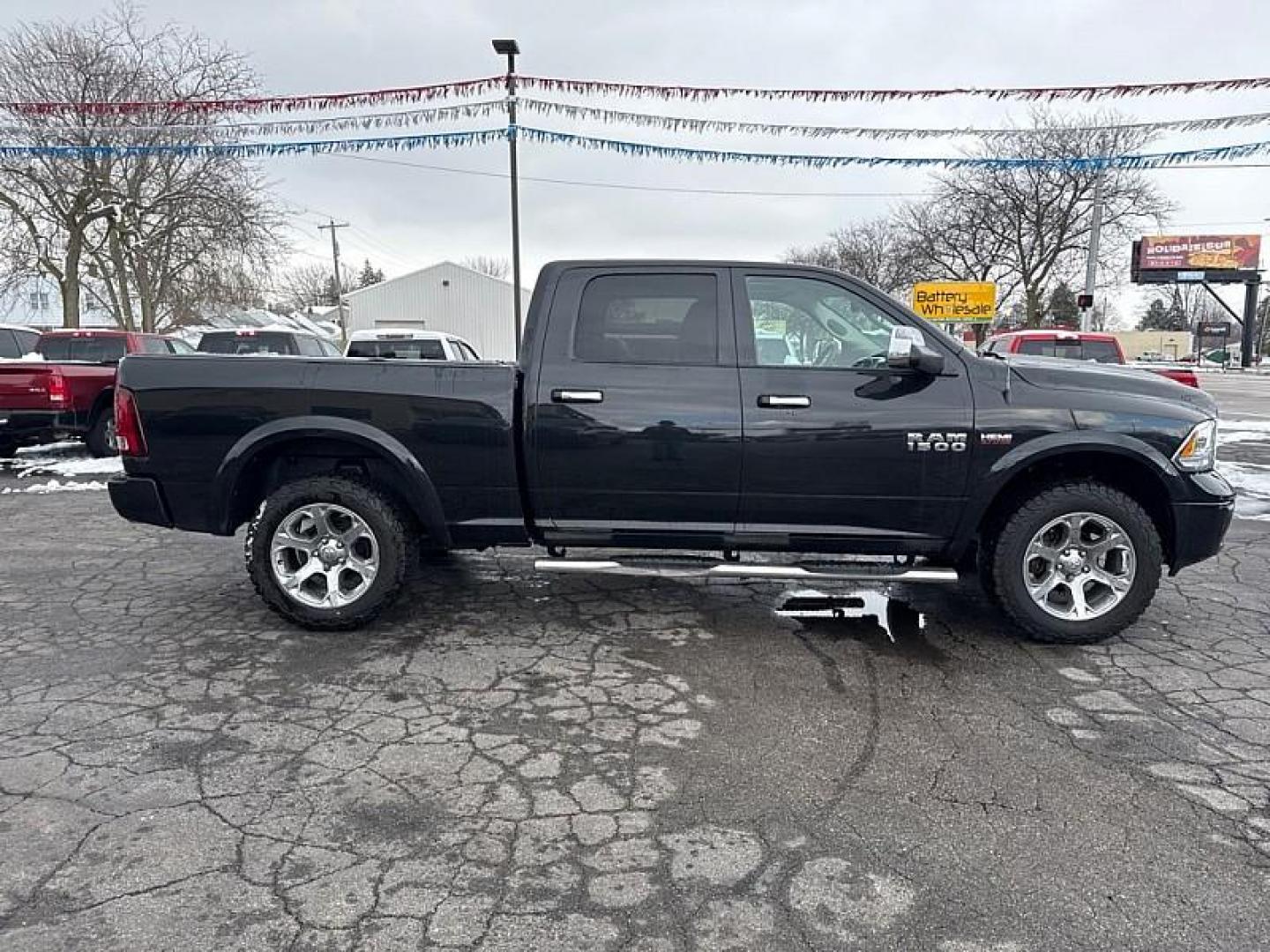 2017 BLACK /BLACK RAM 1500 Laramie Crew Cab LWB 4WD (1C6RR7VT4HS) with an 5.7L V8 OHV 16V engine, 8A transmission, located at 3304 Woodville Road, Northwood, OH, 43619, (419) 210-8019, 41.612694, -83.480743 - Your #1 Destination for Auto Loans and mdash;No Matter Your Credit!At our dealership, we believe everyone deserves the opportunity to drive their dream car and mdash;whether you have good credit, bad credit, or no credit at all. With a wide selection of hundreds of cars, trucks, and SUVs, you'll fin - Photo#5