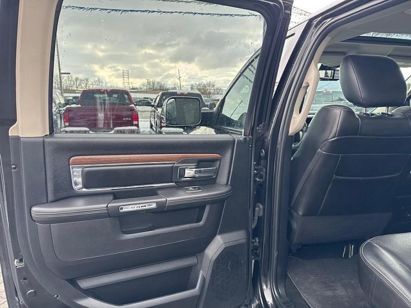 2017 BLACK /BLACK RAM 1500 Laramie Crew Cab LWB 4WD (1C6RR7VT4HS) with an 5.7L V8 OHV 16V engine, 8A transmission, located at 3304 Woodville Road, Northwood, OH, 43619, (419) 210-8019, 41.612694, -83.480743 - Your #1 Destination for Auto Loans and mdash;No Matter Your Credit!At our dealership, we believe everyone deserves the opportunity to drive their dream car and mdash;whether you have good credit, bad credit, or no credit at all. With a wide selection of hundreds of cars, trucks, and SUVs, you'll fin - Photo#10