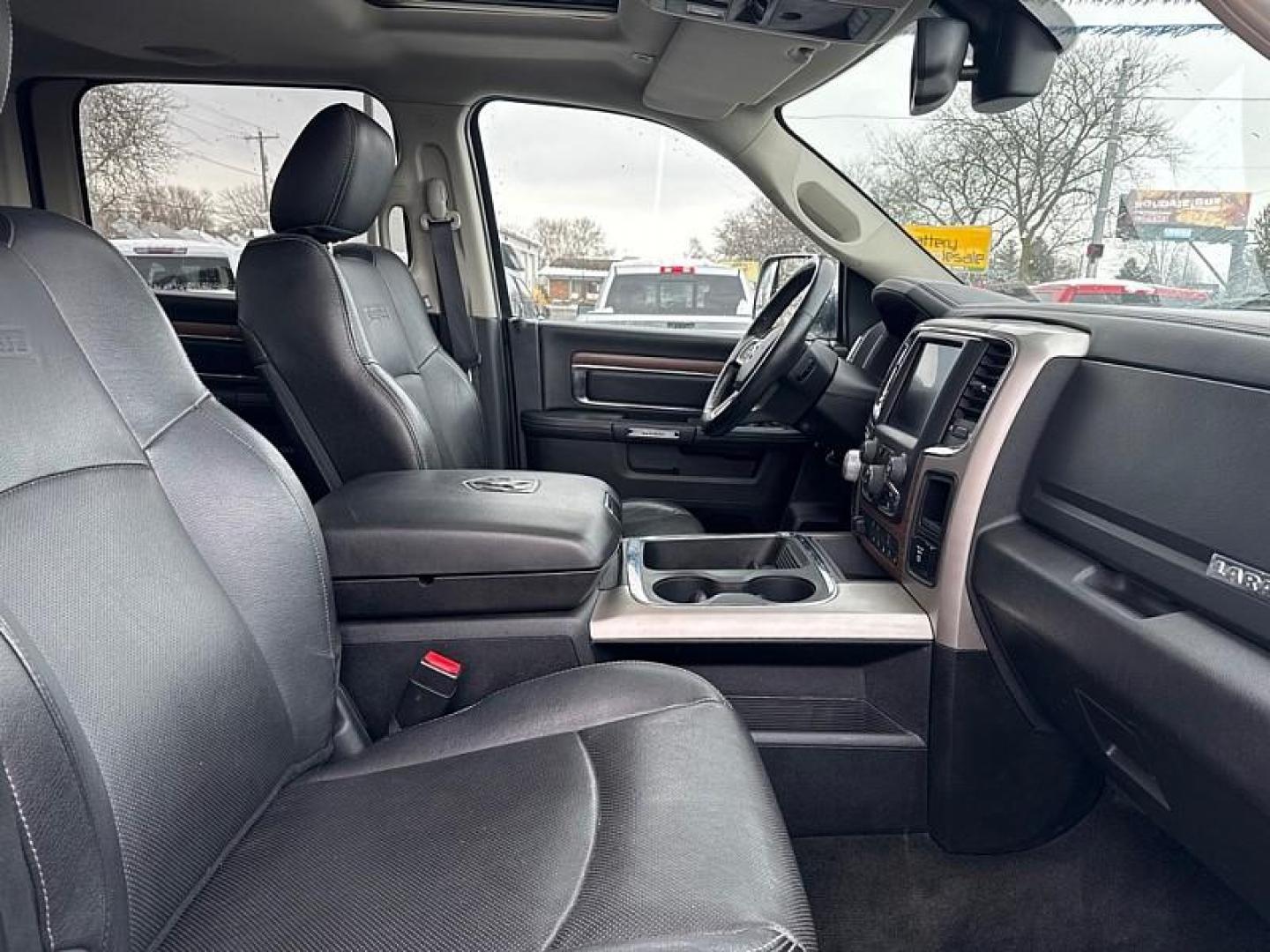 2017 BLACK /BLACK RAM 1500 Laramie Crew Cab LWB 4WD (1C6RR7VT4HS) with an 5.7L V8 OHV 16V engine, 8A transmission, located at 3304 Woodville Road, Northwood, OH, 43619, (419) 210-8019, 41.612694, -83.480743 - Your #1 Destination for Auto Loans and mdash;No Matter Your Credit!At our dealership, we believe everyone deserves the opportunity to drive their dream car and mdash;whether you have good credit, bad credit, or no credit at all. With a wide selection of hundreds of cars, trucks, and SUVs, you'll fin - Photo#15