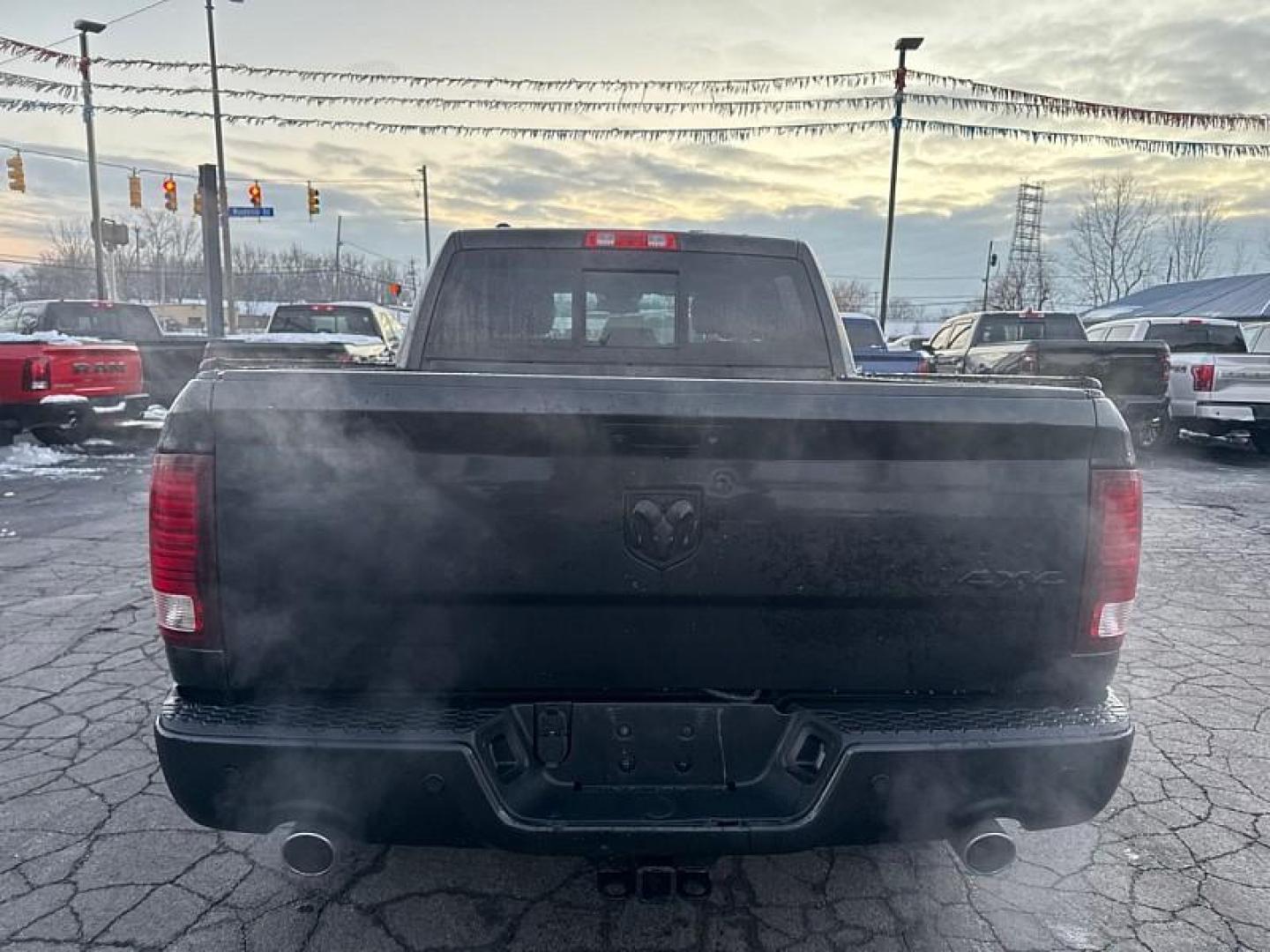 2017 BLACK /BLACK RAM 1500 Sport Crew Cab SWB 4WD (1C6RR7MT9HS) with an 5.7L V8 OHV 16V engine, 8A transmission, located at 3304 Woodville Road, Northwood, OH, 43619, (419) 210-8019, 41.612694, -83.480743 - Photo#3