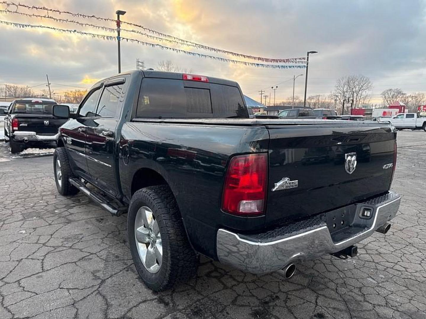 2015 GREEN /BLACK RAM 1500 SLT Crew Cab SWB 4WD (1C6RR7LT8FS) with an 5.7L V8 OHV 16V engine, 6-Speed Automatic transmission, located at 3304 Woodville Road, Northwood, OH, 43619, (419) 210-8019, 41.612694, -83.480743 - Photo#2