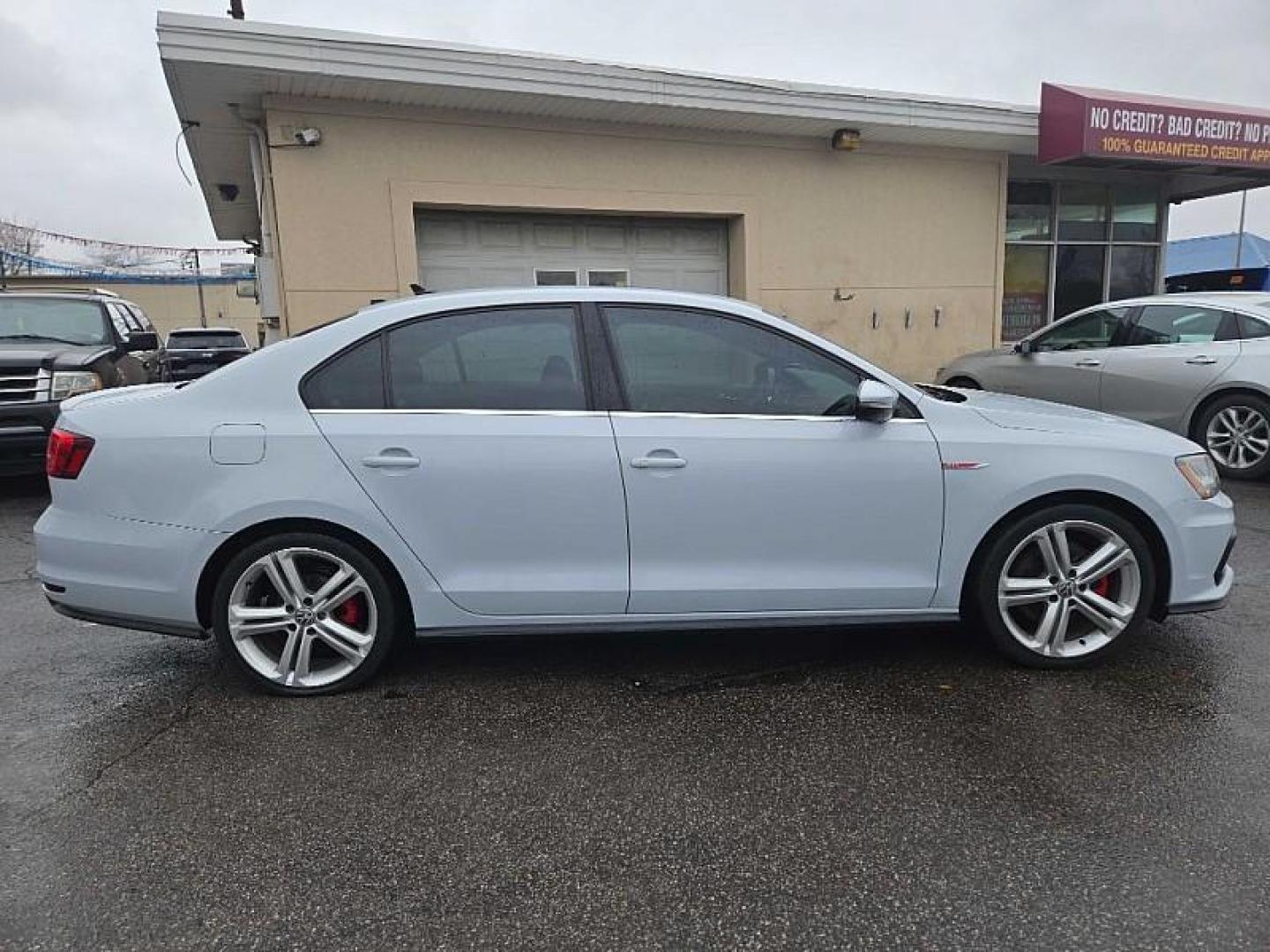 2017 WHITE /BLACK Volkswagen Jetta 2.0T GLI 6A (3VW4T7AJ9HM) with an 2.0L L4 DOHC 16V TURBO engine, 6A transmission, located at 3304 Woodville Road, Northwood, OH, 43619, (419) 210-8019, 41.612694, -83.480743 - Your #1 Destination for Auto Loans and mdash;No Matter Your Credit!At our dealership, we believe everyone deserves the opportunity to drive their dream car and mdash;whether you have good credit, bad credit, or no credit at all. With a wide selection of hundreds of cars, trucks, and SUVs, you'll fin - Photo#5