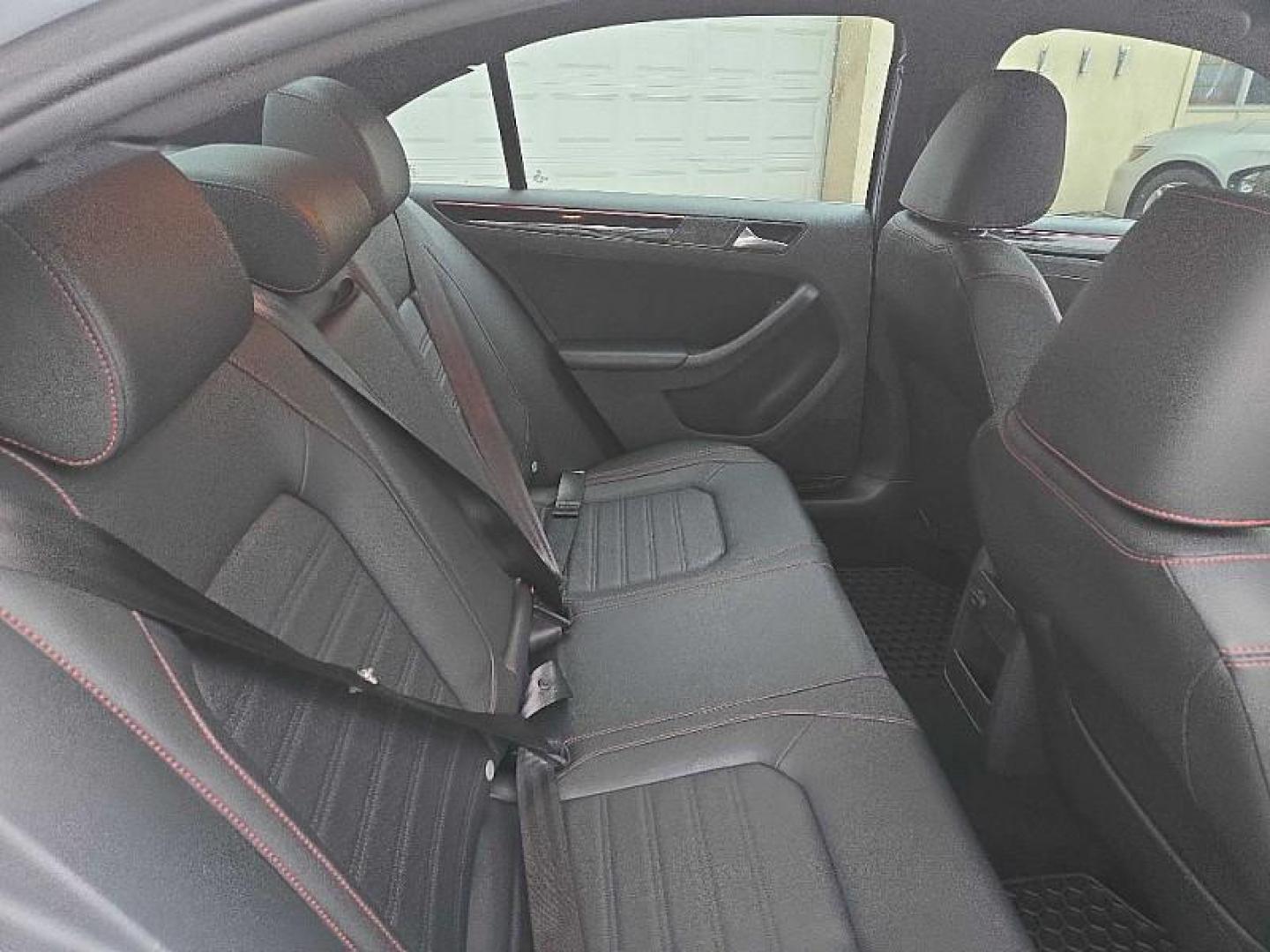 2017 WHITE /BLACK Volkswagen Jetta 2.0T GLI 6A (3VW4T7AJ9HM) with an 2.0L L4 DOHC 16V TURBO engine, 6A transmission, located at 3304 Woodville Road, Northwood, OH, 43619, (419) 210-8019, 41.612694, -83.480743 - Your #1 Destination for Auto Loans and mdash;No Matter Your Credit!At our dealership, we believe everyone deserves the opportunity to drive their dream car and mdash;whether you have good credit, bad credit, or no credit at all. With a wide selection of hundreds of cars, trucks, and SUVs, you'll fin - Photo#14