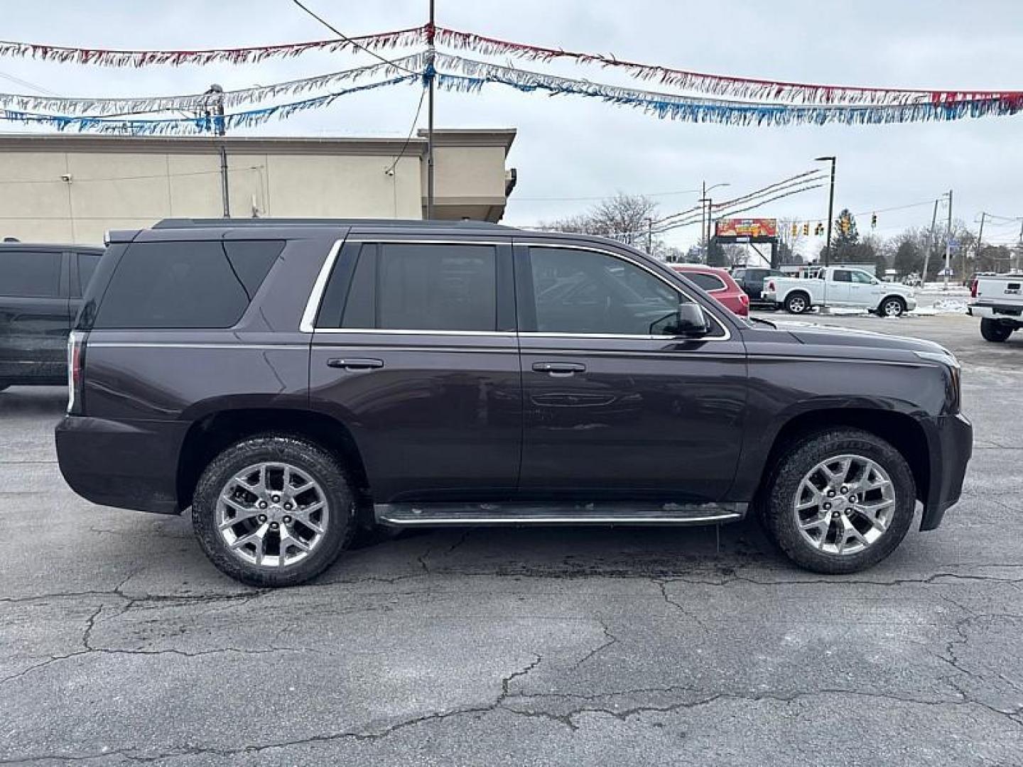 2015 PURPLE /BLACK GMC Yukon SLT 4WD (1GKS2BKC0FR) with an 5.3L V8 OHV 16V FFV engine, 6-Speed Automatic transmission, located at 3304 Woodville Road, Northwood, OH, 43619, (419) 210-8019, 41.612694, -83.480743 - Your #1 Destination for Auto Loans and mdash;No Matter Your Credit!At our dealership, we believe everyone deserves the opportunity to drive their dream car and mdash;whether you have good credit, bad credit, or no credit at all. With a wide selection of hundreds of cars, trucks, and SUVs, you'll fin - Photo#5