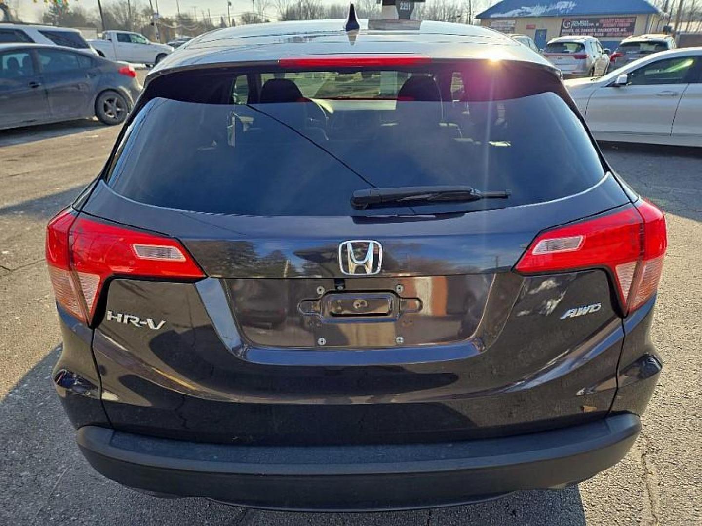 2016 BLACK /BLACK Honda HR-V EX 4WD CVT (3CZRU6H59GM) with an 1.8L L4 DOHC 16V engine, 5-Speed Automatic transmission, located at 3304 Woodville Road, Northwood, OH, 43619, (419) 210-8019, 41.612694, -83.480743 - Your #1 Destination for Auto Loans and mdash;No Matter Your Credit!At our dealership, we believe everyone deserves the opportunity to drive their dream car and mdash;whether you have good credit, bad credit, or no credit at all. With a wide selection of hundreds of cars, trucks, and SUVs, you'll fin - Photo#3