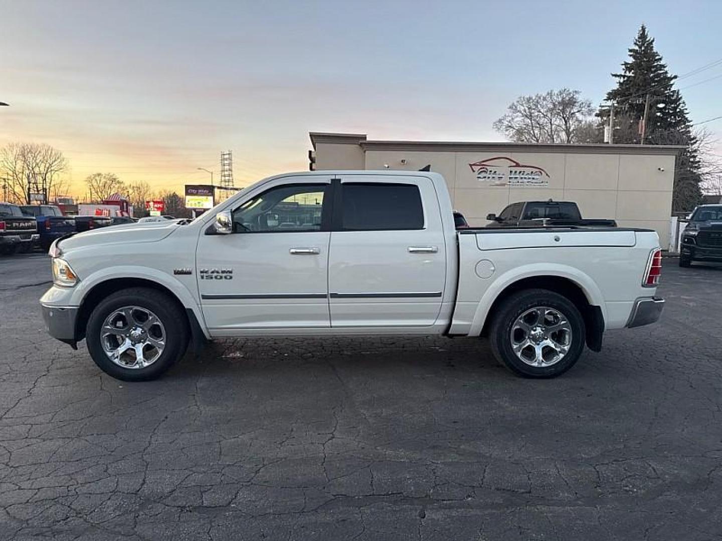 2017 WHITE /BLACK RAM 1500 Laramie Crew Cab SWB 4WD (1C6RR7NT2HS) with an 5.7L V8 OHV 16V engine, 8A transmission, located at 3304 Woodville Road, Northwood, OH, 43619, (419) 210-8019, 41.612694, -83.480743 - Your #1 Destination for Auto Loans and mdash;No Matter Your Credit!At our dealership, we believe everyone deserves the opportunity to drive their dream car and mdash;whether you have good credit, bad credit, or no credit at all. With a wide selection of hundreds of cars, trucks, and SUVs, you'll fin - Photo#1
