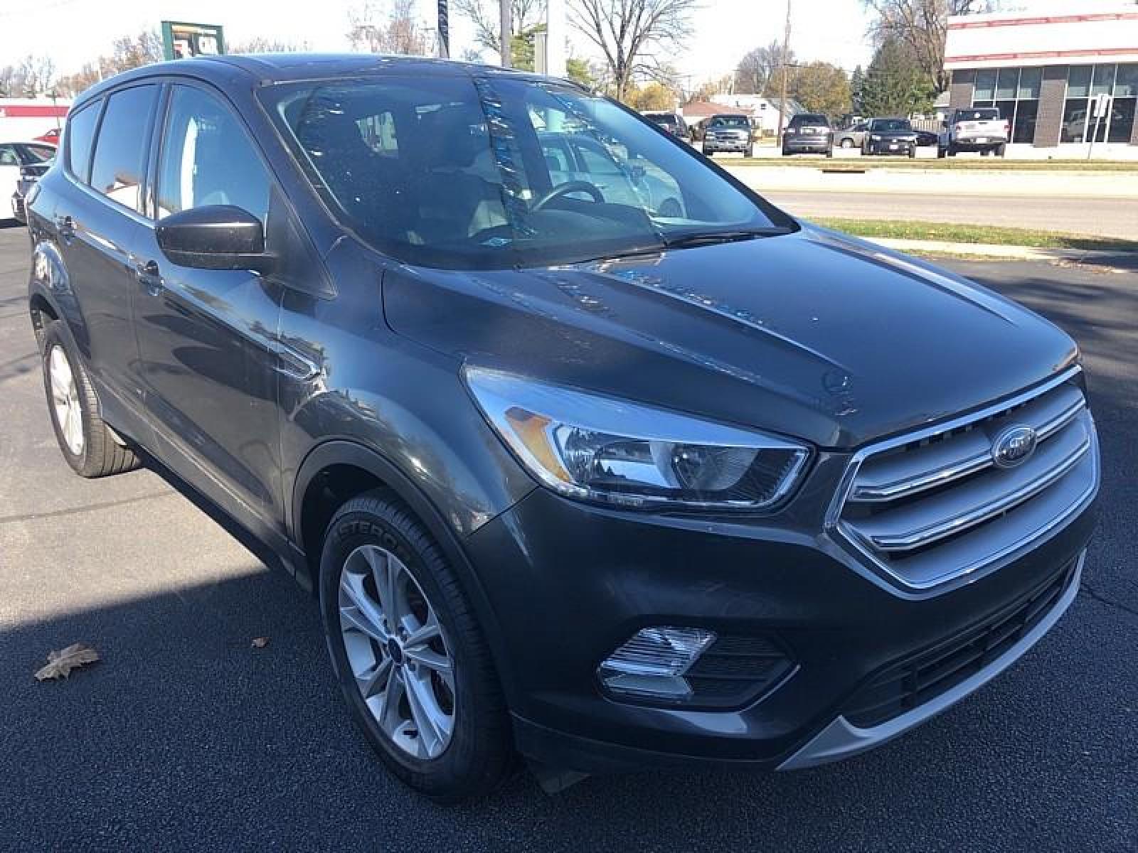 2017 GREY Ford Escape (1FMCU9G93HU) with an 4-Cyl EcoBoost 2.0T engine, Auto 6-Spd w/SelShft transmission, located at 3304 Woodville Road, Northwood, OH, 43619, (419) 210-8019, 41.612694, -83.480743 - We are #1 Auto Loan for Good Bad or No Credit we have hundreds of vehicles to chose from stop on in or just fill out our online application to get approved for auto financing and see your credit score for free by visiting our website today. We have Low Payment Options and Terms Available to Suit Y - Photo #2