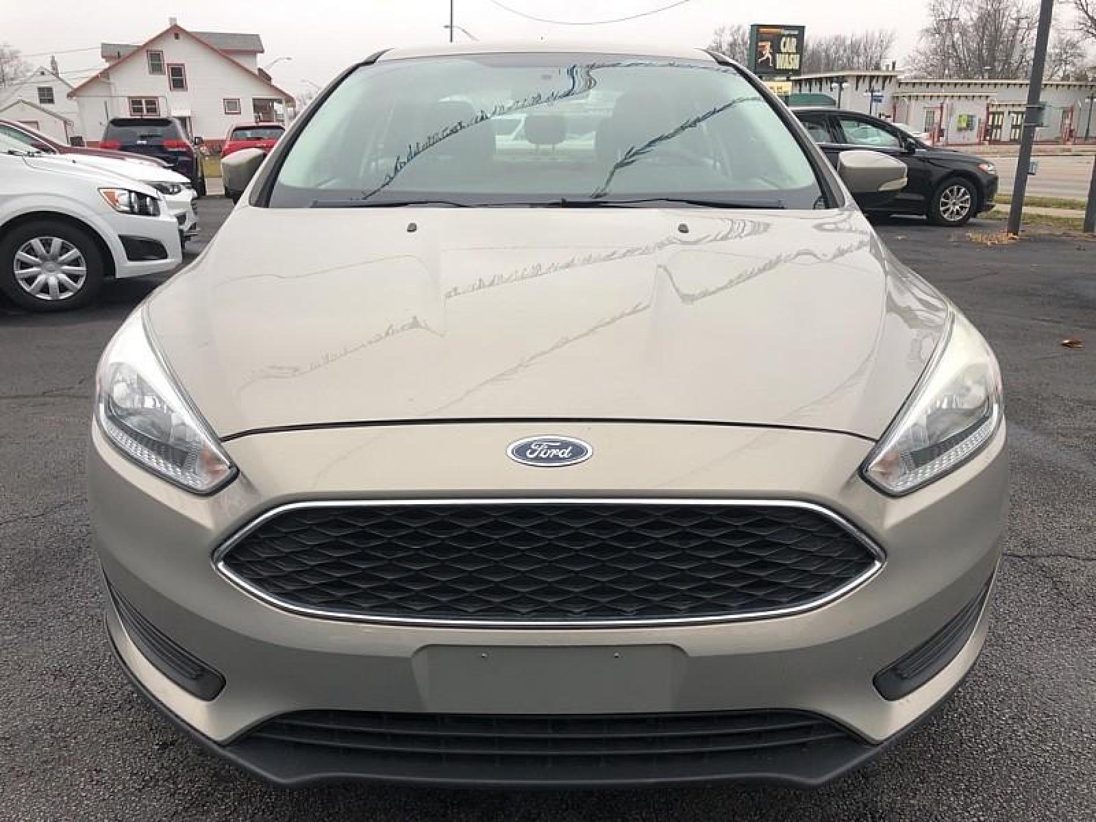 2015 GREY Ford Focus (1FADP3F25FL) with an 4-Cyl Flex Fuel 2.0L engine, Auto 6-Spd Powershift transmission, located at 3304 Woodville Road, Northwood, OH, 43619, (419) 210-8019, 41.612694, -83.480743 - We are #1 Auto Loan for Good Bad or No Credit we have hundreds of vehicles to chose from stop on in or just fill out our online application to get approved for auto financing and see your credit score for free by visiting our website today. We have Low Payment Options and Terms Available to Suit Y - Photo #1