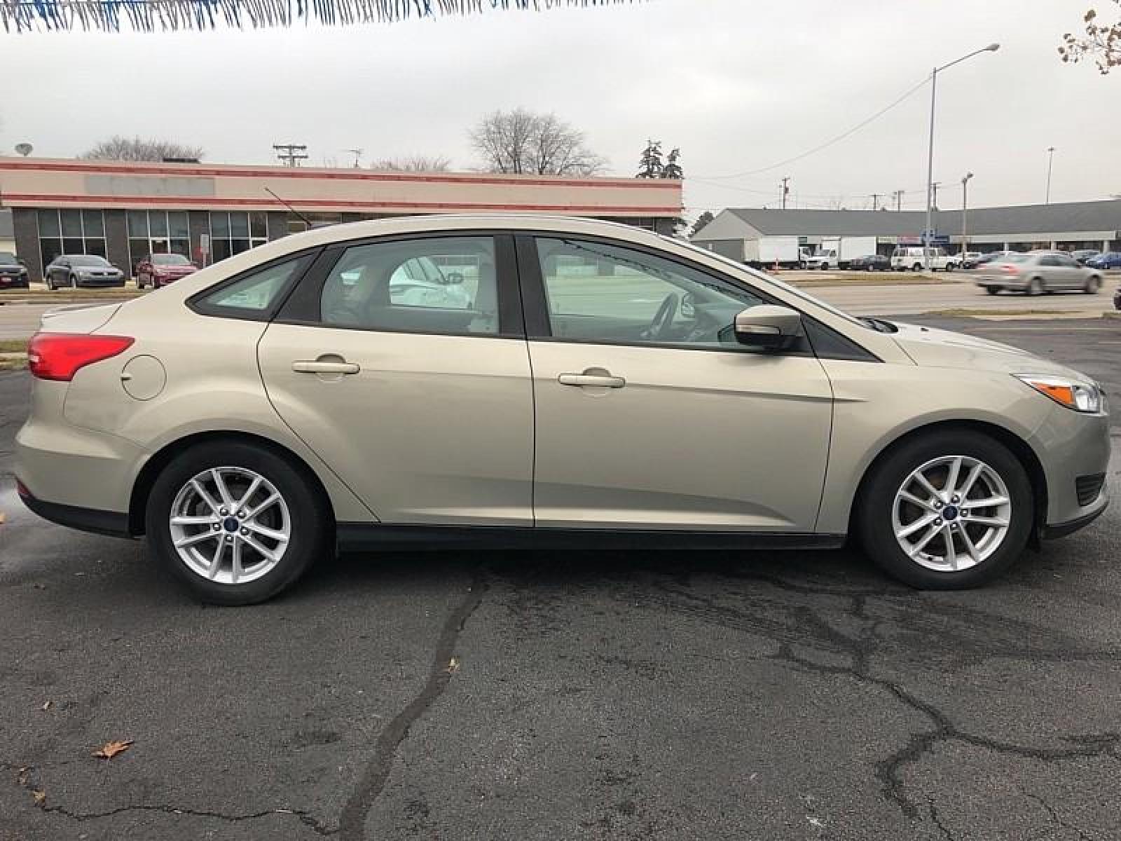 2015 GREY Ford Focus (1FADP3F25FL) with an 4-Cyl Flex Fuel 2.0L engine, Auto 6-Spd Powershift transmission, located at 3304 Woodville Road, Northwood, OH, 43619, (419) 210-8019, 41.612694, -83.480743 - We are #1 Auto Loan for Good Bad or No Credit we have hundreds of vehicles to chose from stop on in or just fill out our online application to get approved for auto financing and see your credit score for free by visiting our website today. We have Low Payment Options and Terms Available to Suit Y - Photo #3