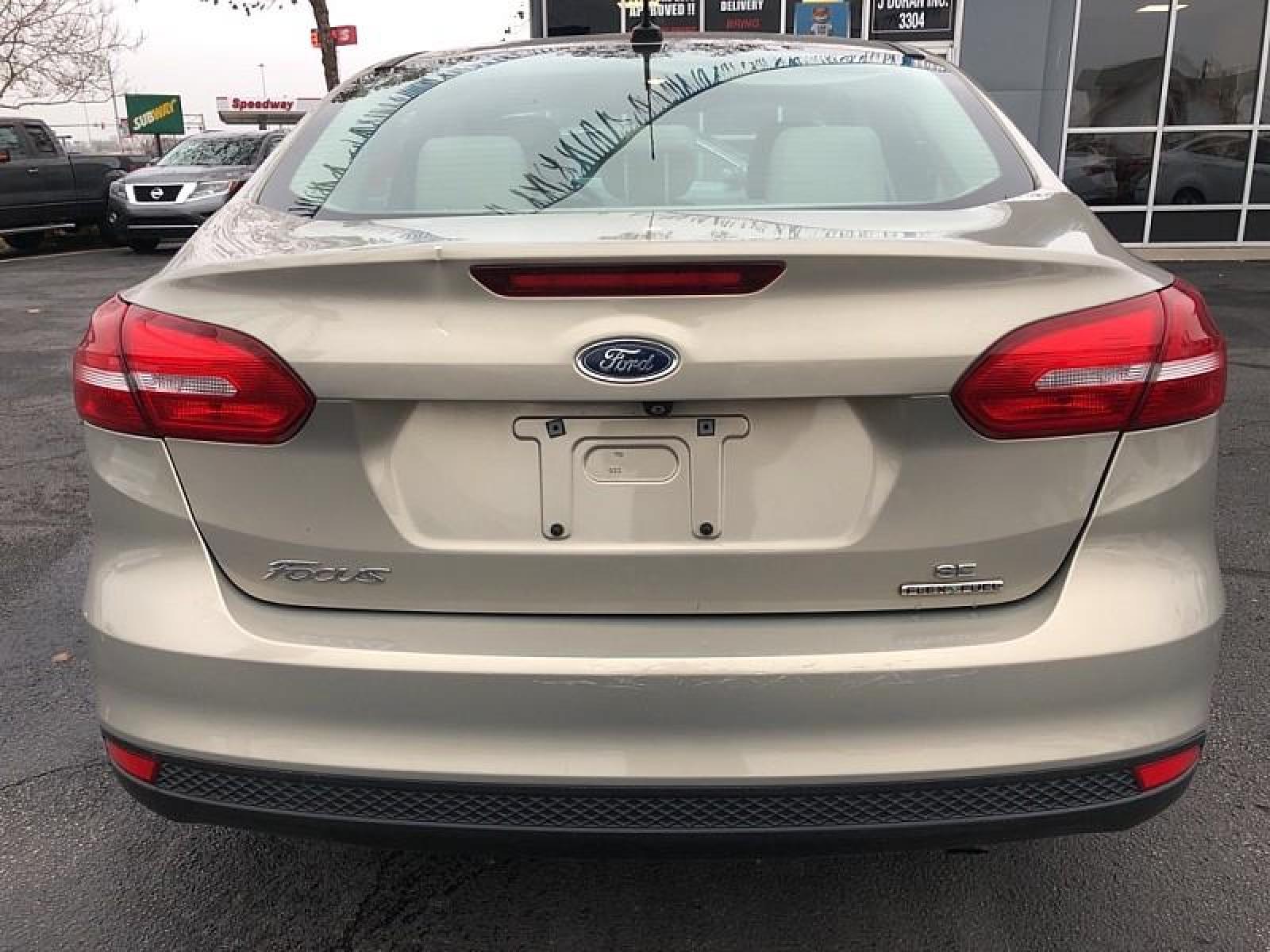 2015 GREY Ford Focus (1FADP3F25FL) with an 4-Cyl Flex Fuel 2.0L engine, Auto 6-Spd Powershift transmission, located at 3304 Woodville Road, Northwood, OH, 43619, (419) 210-8019, 41.612694, -83.480743 - We are #1 Auto Loan for Good Bad or No Credit we have hundreds of vehicles to chose from stop on in or just fill out our online application to get approved for auto financing and see your credit score for free by visiting our website today. We have Low Payment Options and Terms Available to Suit Y - Photo #5