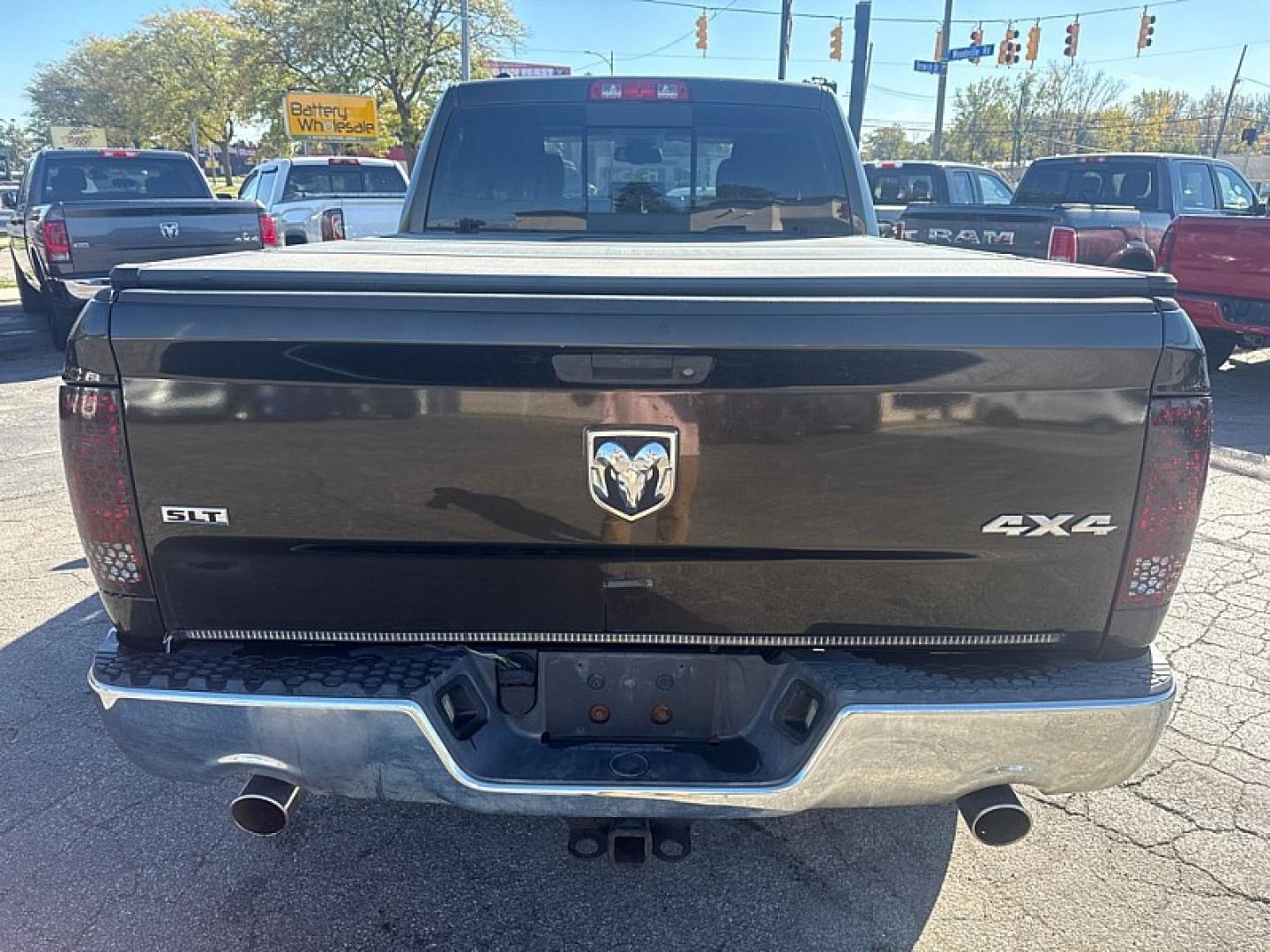 2013 BROWN /GRAY RAM 1500 SLT Quad Cab 4WD (1C6RR7GT9DS) with an 5.7L V8 OHV 16V engine, 6-Speed Automatic transmission, located at 3304 Woodville Road, Northwood, OH, 43619, (419) 210-8019, 41.612694, -83.480743 - Your #1 Destination for Auto Loans and mdash;No Matter Your Credit!At our dealership, we believe everyone deserves the opportunity to drive their dream car and mdash;whether you have good credit, bad credit, or no credit at all. With a wide selection of hundreds of cars, trucks, and SUVs, you'll fin- Photo#3