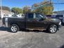 2013 BROWN /GRAY RAM 1500 SLT Quad Cab 4WD (1C6RR7GT9DS) with an 5.7L V8 OHV 16V engine, 6-Speed Automatic transmission, located at 3304 Woodville Road, Northwood, OH, 43619, (419) 210-8019, 41.612694, -83.480743 - Your #1 Destination for Auto Loans and mdash;No Matter Your Credit!At our dealership, we believe everyone deserves the opportunity to drive their dream car and mdash;whether you have good credit, bad credit, or no credit at all. With a wide selection of hundreds of cars, trucks, and SUVs, you'll fin- Photo#5