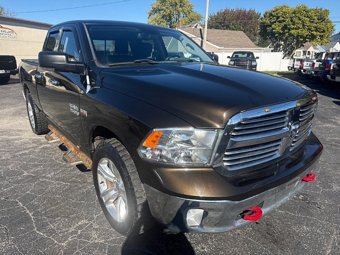 2013 BROWN /GRAY RAM 1500 SLT Quad Cab 4WD (1C6RR7GT9DS) with an 5.7L V8 OHV 16V engine, 6-Speed Automatic transmission, located at 3304 Woodville Road, Northwood, OH, 43619, (419) 210-8019, 41.612694, -83.480743 - Your #1 Destination for Auto Loans and mdash;No Matter Your Credit!At our dealership, we believe everyone deserves the opportunity to drive their dream car and mdash;whether you have good credit, bad credit, or no credit at all. With a wide selection of hundreds of cars, trucks, and SUVs, you'll fin- Photo#6
