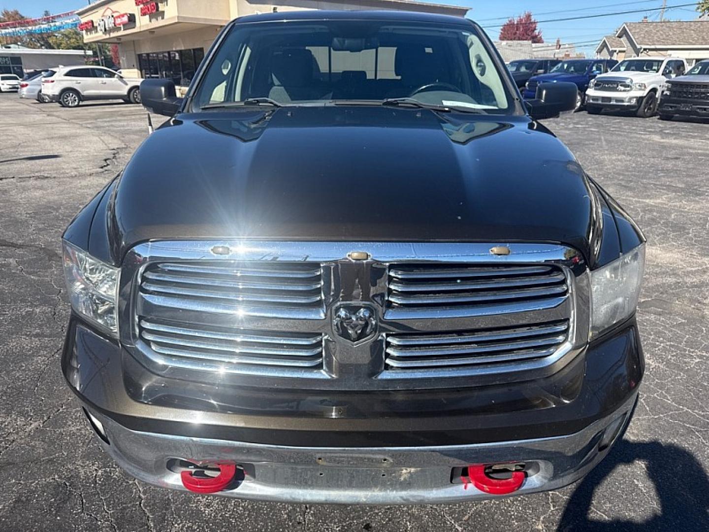 2013 BROWN /GRAY RAM 1500 SLT Quad Cab 4WD (1C6RR7GT9DS) with an 5.7L V8 OHV 16V engine, 6-Speed Automatic transmission, located at 3304 Woodville Road, Northwood, OH, 43619, (419) 210-8019, 41.612694, -83.480743 - Your #1 Destination for Auto Loans and mdash;No Matter Your Credit!At our dealership, we believe everyone deserves the opportunity to drive their dream car and mdash;whether you have good credit, bad credit, or no credit at all. With a wide selection of hundreds of cars, trucks, and SUVs, you'll fin- Photo#7