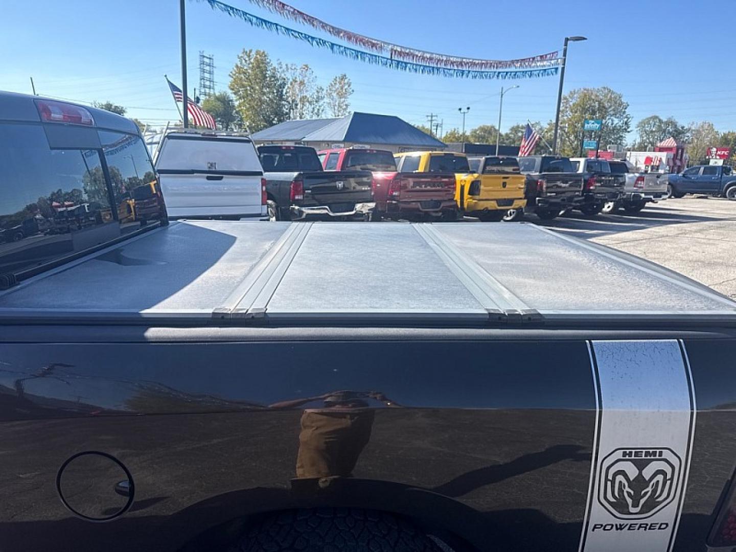 2013 BROWN /GRAY RAM 1500 SLT Quad Cab 4WD (1C6RR7GT9DS) with an 5.7L V8 OHV 16V engine, 6-Speed Automatic transmission, located at 3304 Woodville Road, Northwood, OH, 43619, (419) 210-8019, 41.612694, -83.480743 - Your #1 Destination for Auto Loans and mdash;No Matter Your Credit!At our dealership, we believe everyone deserves the opportunity to drive their dream car and mdash;whether you have good credit, bad credit, or no credit at all. With a wide selection of hundreds of cars, trucks, and SUVs, you'll fin- Photo#17