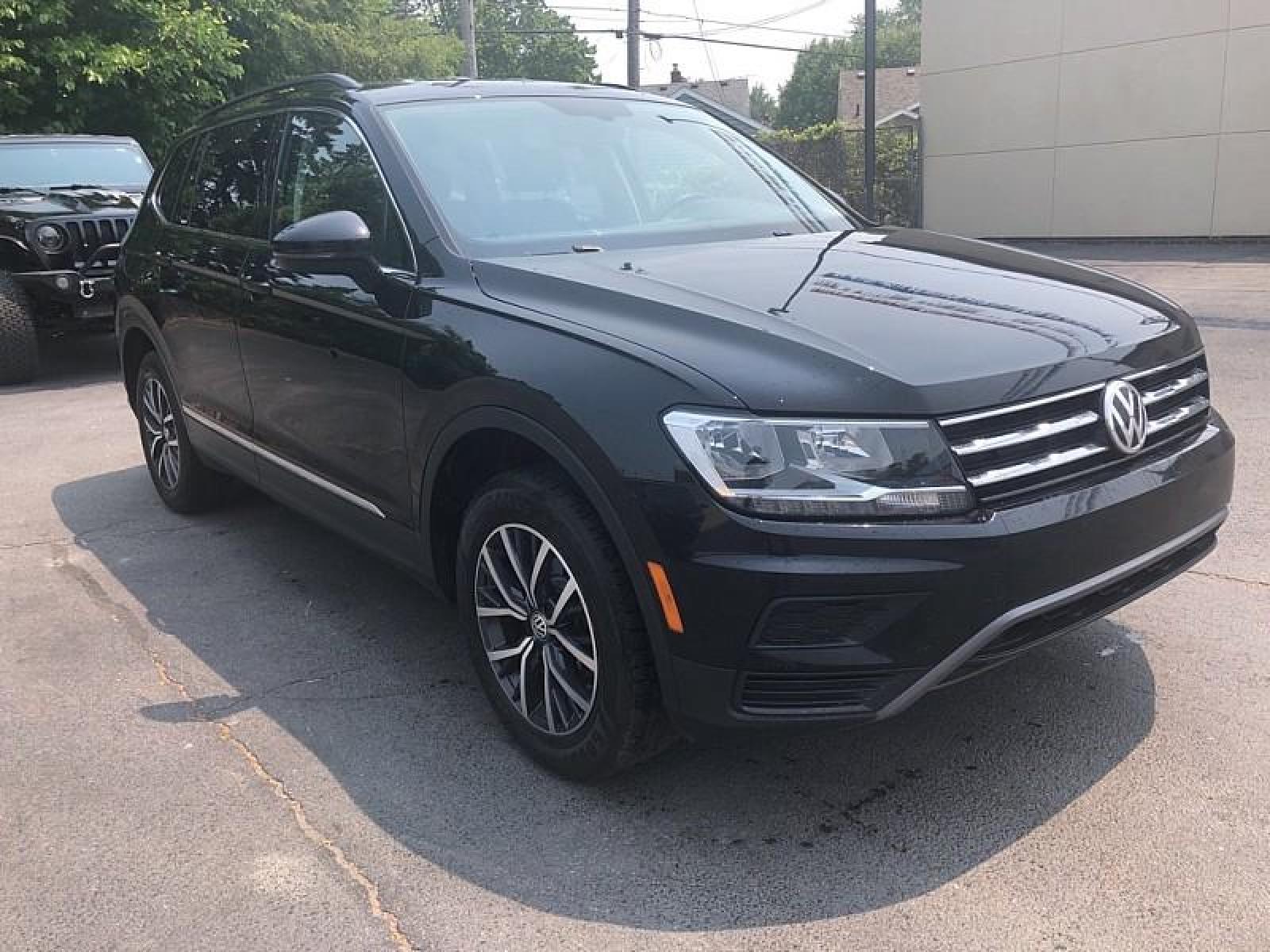 2020 BLACK /BLACK Volkswagen Tiguan (3VV2B7AX2LM) with an 4-Cyl Turbo 2.0 Liter engine, Automatic 8-Spd w/Tiptronic and Sport Mode transmission, located at 3304 Woodville Road, Northwood, OH, 43619, (419) 210-8019, 41.612694, -83.480743 - We are #1 Auto Loan for Good Bad or No Credit we have hundreds of vehicles to choose from stop on in or just fill out our online application to get approved for auto financing and see your credit score for free by visiting our website today. We have Low Payment Options and Terms Available to Suit - Photo #21