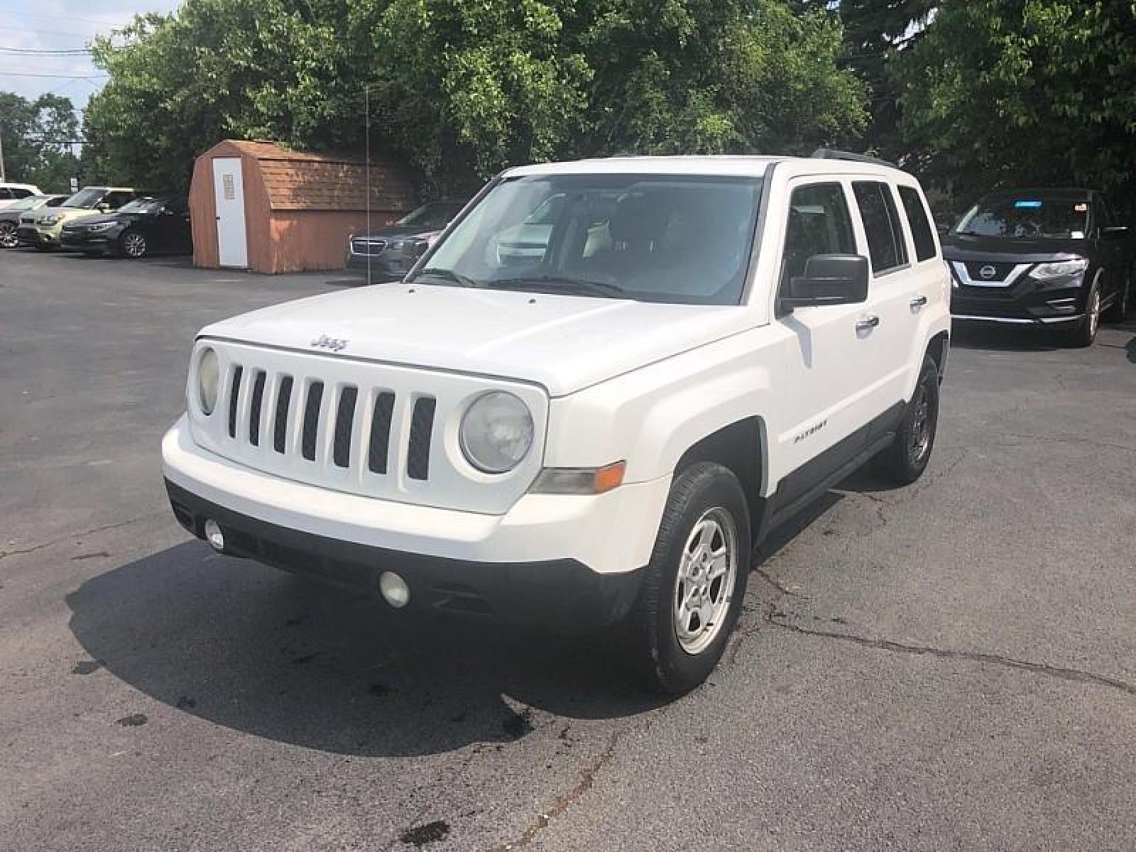 2014 WHITE /BLACK Jeep Patriot (1C4NJPBB6ED) with an 4-Cyl 2.4 Liter engine, Automatic CVT transmission, located at 3304 Woodville Road, Northwood, OH, 43619, (419) 210-8019, 41.612694, -83.480743 - We are #1 Auto Loan for Good Bad or No Credit we have hundreds of vehicles to choose from stop on in or just fill out our online application to get approved for auto financing and see your credit score for free by visiting our website today. We have Low Payment Options and Terms Available to Suit - Photo #0