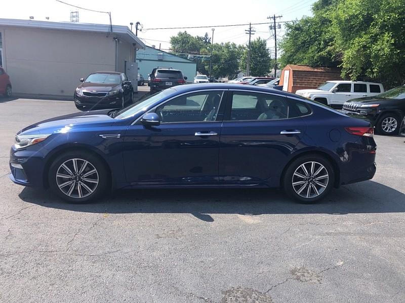 2019 BLUE /BLACK Kia Optima (5XXGU4L10KG) with an 4-Cyl 1.6 Liter engine, Automatic transmission, located at 3304 Woodville Road, Northwood, OH, 43619, (419) 210-8019, 41.612694, -83.480743 - We are #1 Auto Loan for Good Bad or No Credit we have hundreds of vehicles to choose from stop on in or just fill out our online application to get approved for auto financing and see your credit score for free by visiting our website today. We have Low Payment Options and Terms Available to Suit - Photo #1
