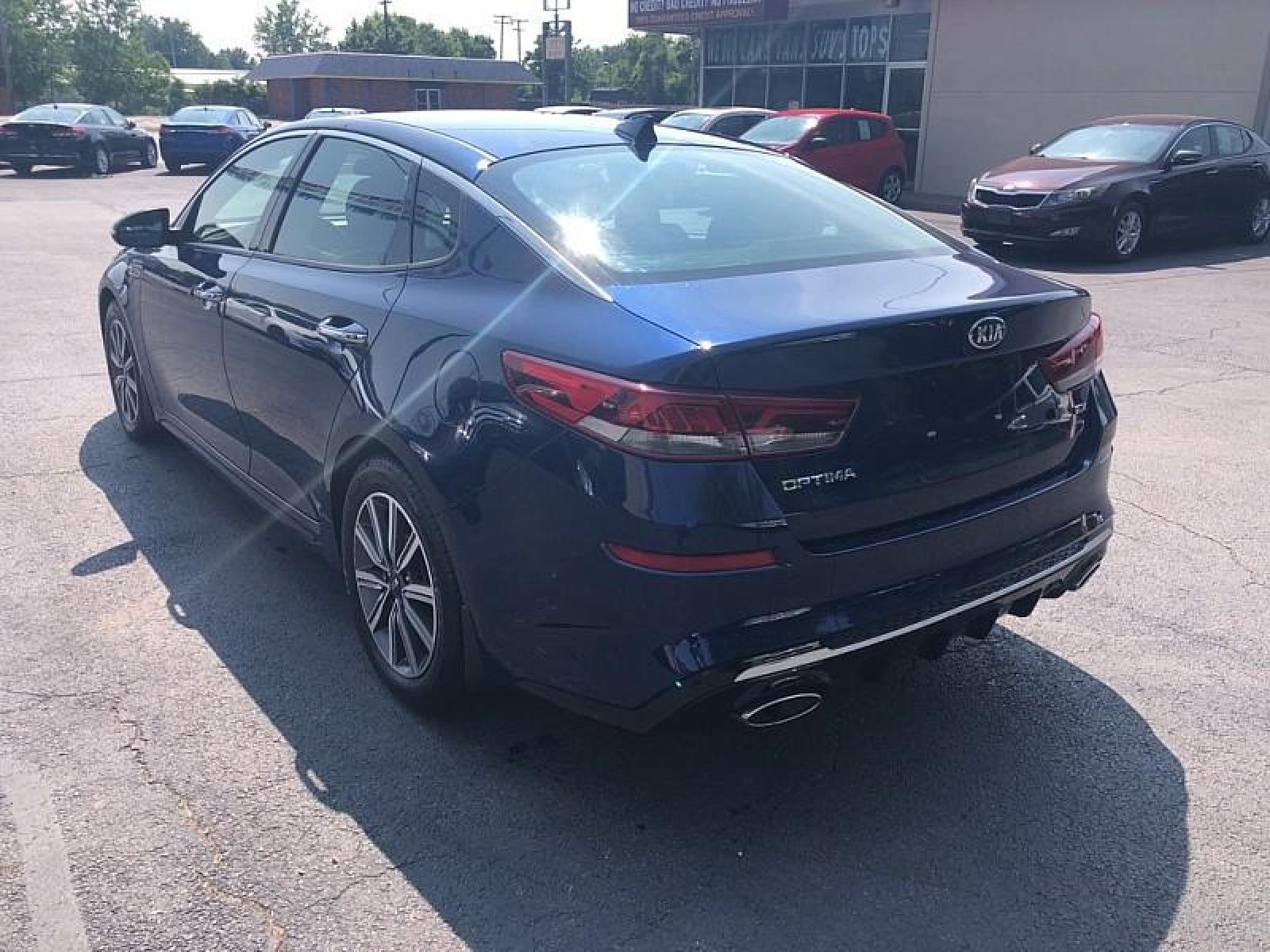 2019 BLUE /BLACK Kia Optima (5XXGU4L10KG) with an 4-Cyl 1.6 Liter engine, Automatic transmission, located at 3304 Woodville Road, Northwood, OH, 43619, (419) 210-8019, 41.612694, -83.480743 - We are #1 Auto Loan for Good Bad or No Credit we have hundreds of vehicles to choose from stop on in or just fill out our online application to get approved for auto financing and see your credit score for free by visiting our website today. We have Low Payment Options and Terms Available to Suit - Photo #2