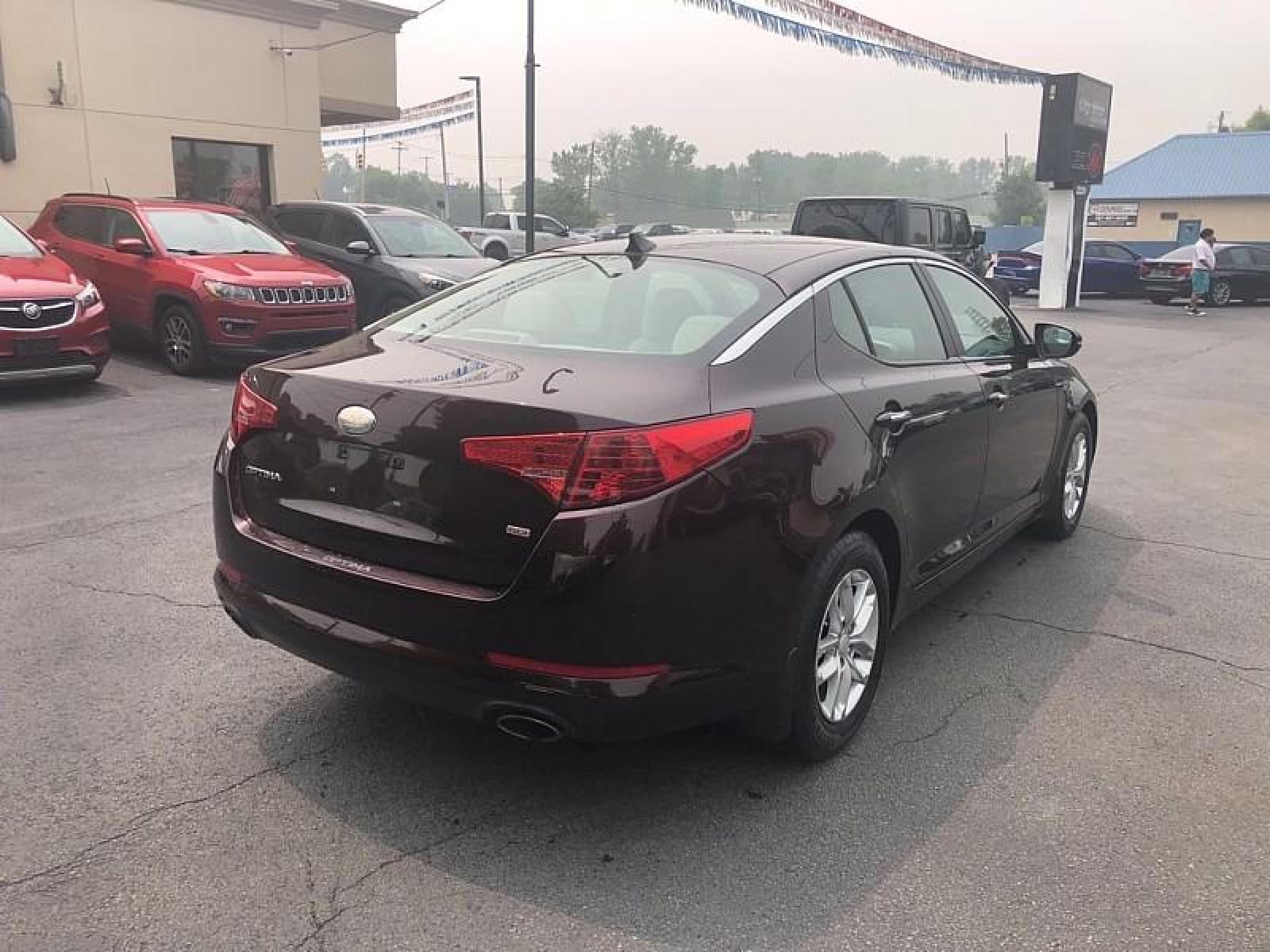 2013 BURGUNDY /TAN Kia Optima (5XXGM4A75DG) with an 4-Cyl 2.4 Liter engine, Auto 6-Spd Sportmatic transmission, located at 3304 Woodville Road, Northwood, OH, 43619, (419) 210-8019, 41.612694, -83.480743 - We are #1 Auto Loan for Good Bad or No Credit we have hundreds of vehicles to choose from stop on in or just fill out our online application to get approved for auto financing and see your credit score for free by visiting our website today. We have Low Payment Options and Terms Available to Suit - Photo #4