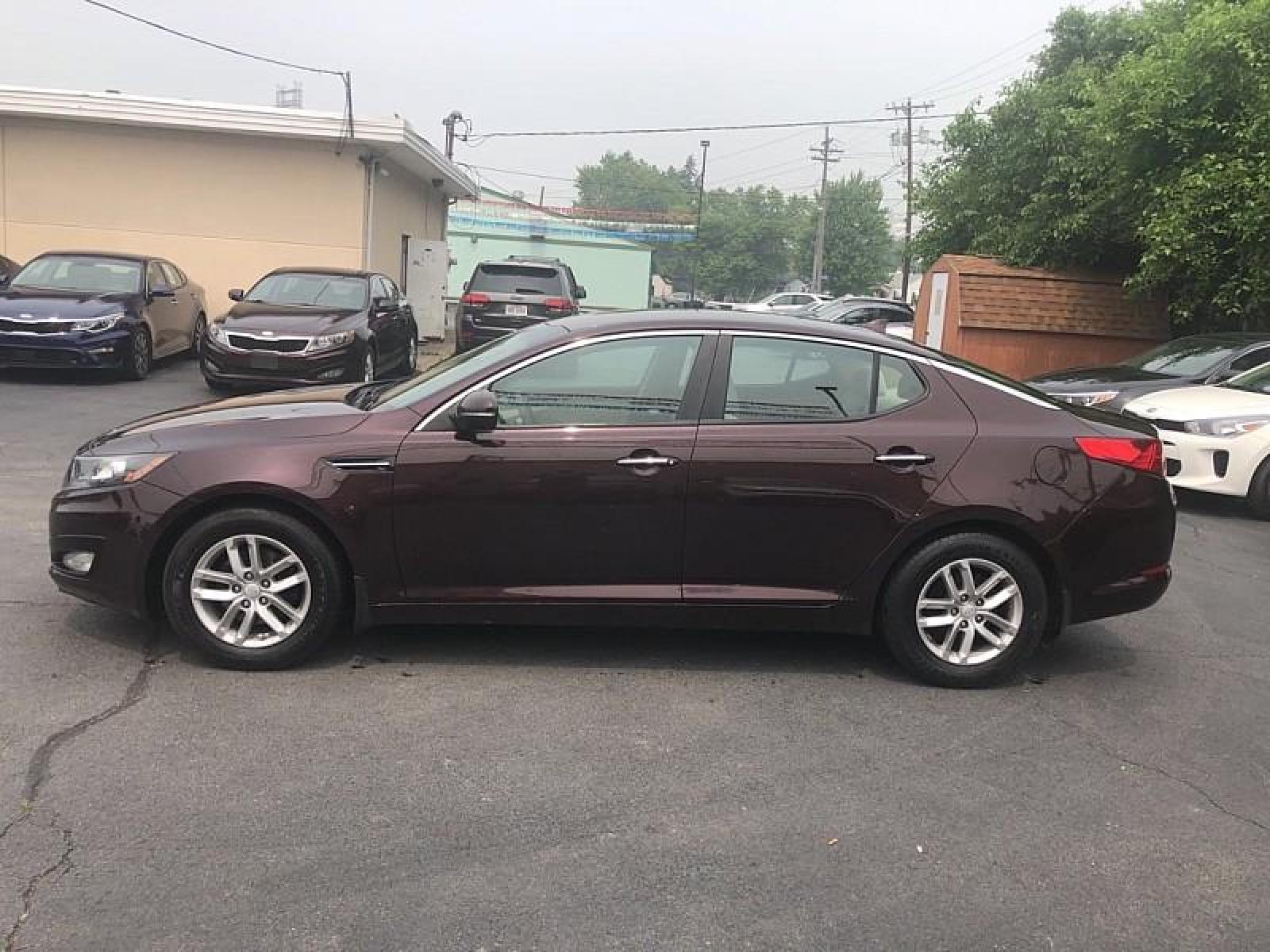 2013 BURGUNDY /TAN Kia Optima (5XXGM4A75DG) with an 4-Cyl 2.4 Liter engine, Auto 6-Spd Sportmatic transmission, located at 3304 Woodville Road, Northwood, OH, 43619, (419) 210-8019, 41.612694, -83.480743 - We are #1 Auto Loan for Good Bad or No Credit we have hundreds of vehicles to choose from stop on in or just fill out our online application to get approved for auto financing and see your credit score for free by visiting our website today. We have Low Payment Options and Terms Available to Suit - Photo #7